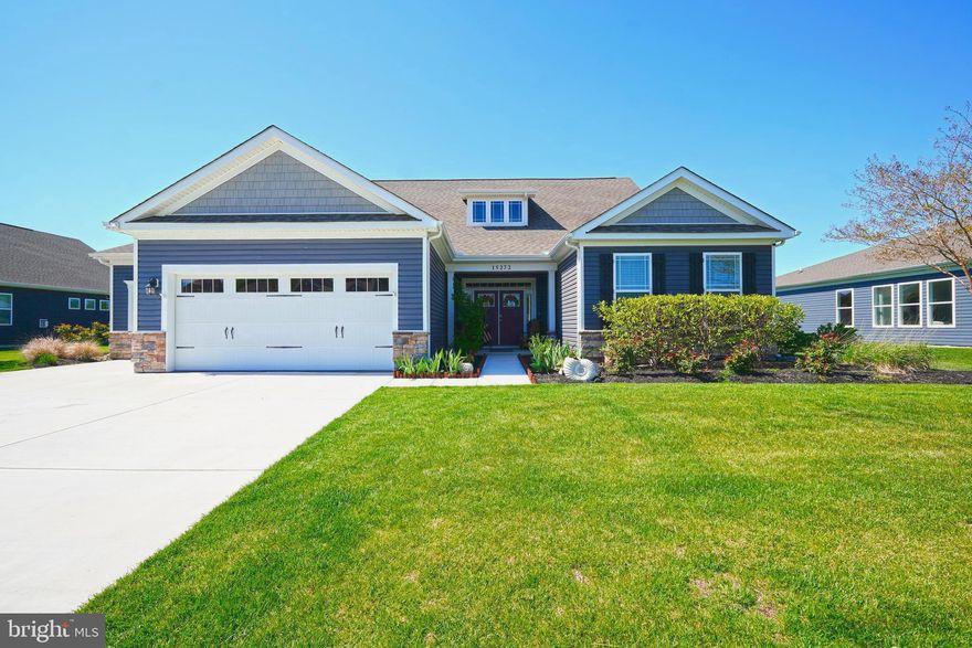 POND FRONT STUNNER! Welcome to this like-new D.R. Horton Coastal floorplan, located on a premium pond-front lot in Woodfield Preserve - Milton, DE. This highly desirable 5-bedroom home offers a spacious open-concept layout, soaring 11-foot ceilings, and stunning water views from the main living areas. The gourmet eat-in kitchen features quartz countertops, stainless steel appliances, a large pantry, and ample space for entertaining. The inviting living room includes a cozy gas fireplace and expansive windows that showcase the serene pond setting. The first-floor owner’s suite provides privacy and comfort with a large walk-in closet and en-suite bath, while two additional bedrooms are thoughtfully positioned on the main level. Upstairs, you’ll find two more bedrooms and a full bath, ideal for guests, family, or a home office setup. Step outside to a covered patio overlooking the backyard and pond, enhanced by a fenced-in yard (approx. $7,700 upgrade)—perfect for pets, play, or added privacy. The property also includes a private irrigation well (approx. $5,000 upgrade), offering an efficient and cost-saving way to maintain the lush lawn and landscaping. Additional highlights include a 3-car garage, generous room sizes, and modern finishes throughout. Located just a short walk to the community clubhouse and pool, and minutes from Broadkill Beach, Lewes, shopping, dining, and Route 1. Adjacent to The Rookery South Golf Course, this home offers both convenience and a scenic lifestyle. Why buyers love it: pond-front views, flexible 5-bedroom layout, first-floor primary suite, fenced yard, irrigation well, and proximity to beaches and amenities. Schedule your private showing TODAY—this one won’t last!
