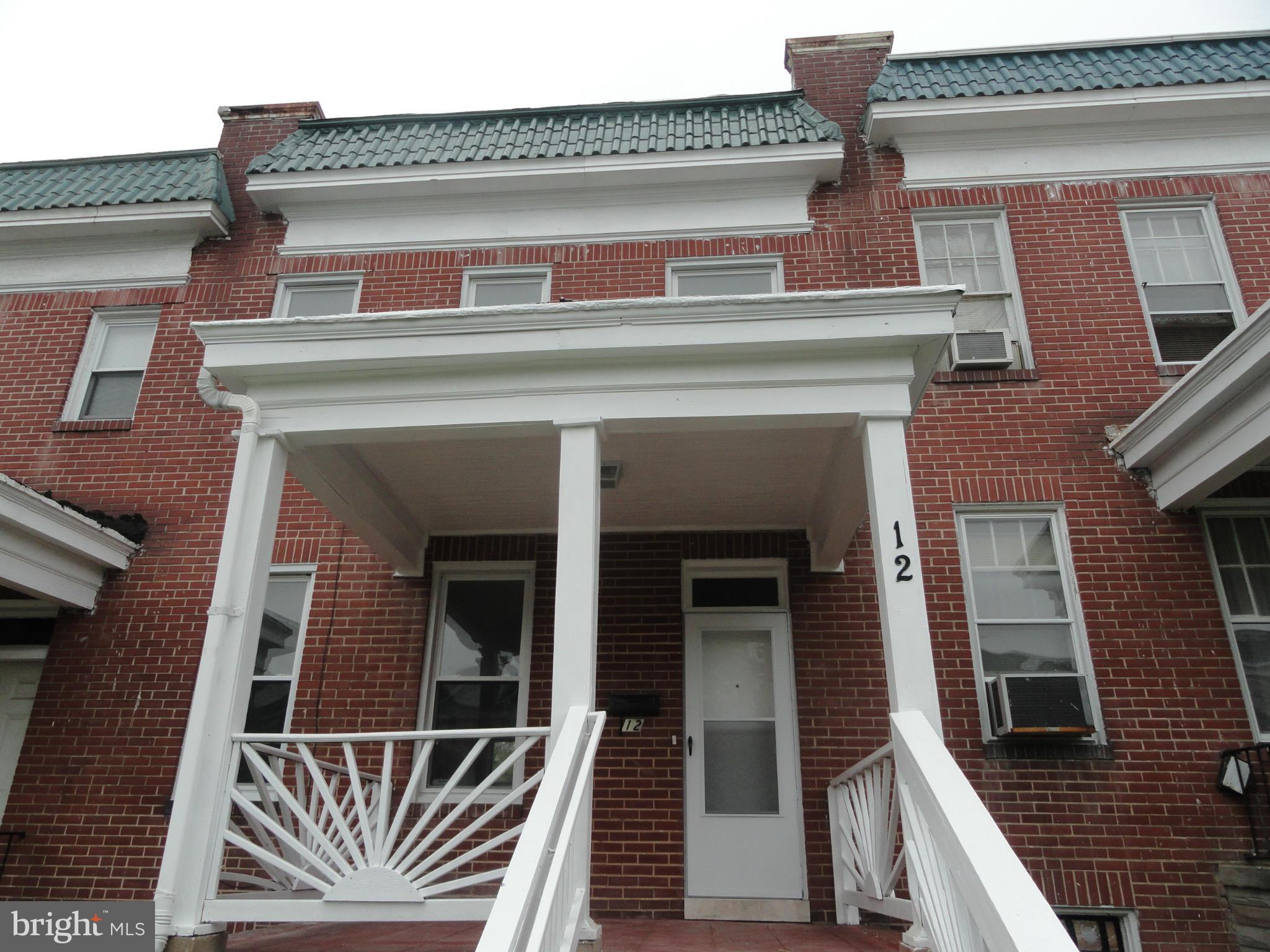 Huge 4 bedroom 2 bath Porchfront town home in West Baltimore - Pictures represent property condition prior to tenant occupancy. Long term tenant has vacated and pro[erty owner is motivated to sellThis property will not last long . Highest and Best offers are preferd. The seller will make no repairs or upgrades . This home is sold as is with no expressed warranty. Show anytime. The property is in need of some TLC
