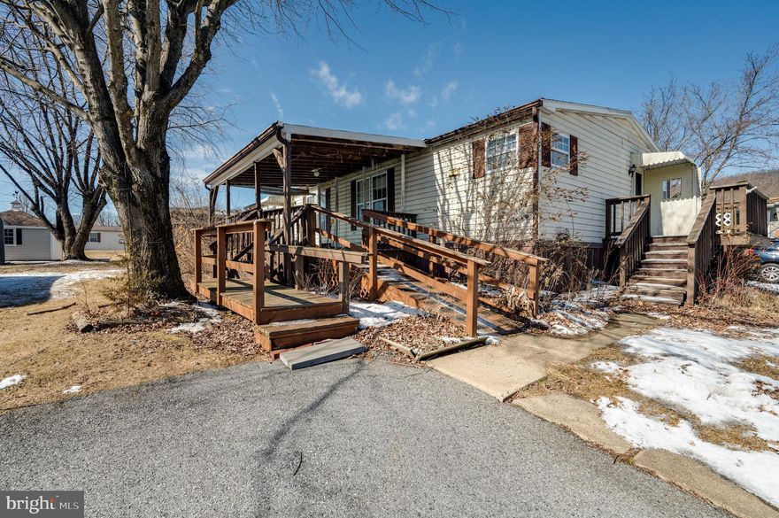 Welcome to the desirable Mountain Springs mobile home park and campground! This community offers low taxes and includes access to a large pool, covered picnic area, playground, and dog park. Enjoy the benefits of shared campground amenities and a large, private yard space. Perfect for those that enjoy spending time outdoors. This large 4 bedroom and 2 bath home provides all the living space that you need. A formal dining room area, a generously sized kitchen, and a large covered deck are all key features. The association fee includes common area maintenance, recreation facility, road maintenance, sewer, snow removal, trash, and water. The home needs some TLC  but offers a very affordable housing option and an opportunity to personalize and add value. With a large lot, off-street parking, and a spacious shed, this home is perfect for those looking for a budget-friendly living solution. All occupants over 18 must pass a background check and apply through an HOA approval process. Property is being sold as-is.  Schedule a showing today and experience the charm of the Mountain Springs Community!