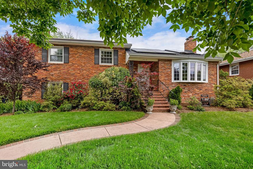 Welcome to 1410 Juliana Pl, Alexandria, VA 22304! This stunning 4-bedroom, 3-full bath house offers a number of surprises and exceptional features that make it a highly livable and desirable home.

Upon entering, the formal living room welcomes you, featuring unique built-ins and a wood burning fireplace that add character and charm to the space while the large bay window floods the room with natural light.

The kitchen has been fully renovated and features a 6-burner gas cooktop, a French-door style refrigerator/freezer, double ovens, built-in microwave, wine refrigerator, quartz counters and counter seating for two. 

The real surprise and hub of the home is the spacious 400 sq/ft great room at the rear of the house. Pella windows on three sides allow natural light to pour in, creating a warm and inviting area. With access to the kitchen, dining room and deck, this room serves as the heart of the house, perfect for relaxation, family moments and entertaining guests.

Step outside onto the expansive deck, perfect for outdoor living and entertaining. This outdoor oasis features a built-in hot tub, ample room for a grill and plenty of seating. It is an ideal space for gatherings and summer barbecues.

Additional amenities include three renovated bathrooms, large living spaces on the two lower levels (one with a gas fireplace), numerous storage closets (including two cedar closets), an additional freezer in the laundry room and a carport with a large, secure attached shed.

The home also features a new boiler, new roof and over 30 solar panels - significantly reducing energy costs now and for years to come!

Located on an exceptionally quiet street, this property offers easy access to I-395, I-495, Ronald Reagan Washington Airport and several Metro stations. It is also just minutes away from numerous shopping, dining and entertainment areas, including Old Town Alexandria, Shirlington and the Landmark redevelopment.