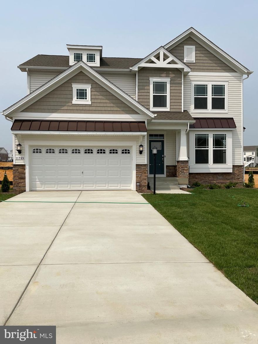 The Somerset will be ready for your family by May! With room for everyone, this home has it all! This spacious three-story home features an open concept living area with a morning room and quick access to the backyard overlooking the forest! The first floor boasts a formal dining room near the foyer, while a 1st floor 5th bedroom is tucked away in the back. Upstairs are all four bedrooms, including the lavish owner’s suite.  Downstairs is a finished basement with another full bath.  Photos are for illustration purposes.