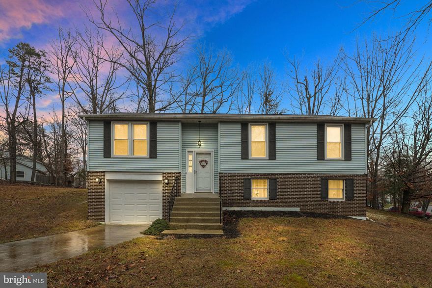 RUN don’t walk to this beautiful home! Located in the sought after Heatherwick community of Brandywine, Maryland, this split foyer corner lot home has been updated and offers so much living space! The home features 3 bedrooms and 3 full bathrooms. The kitchen has been completely upgraded with granite tops and stainless steel appliances. The living room boasts fantastic natural lighting and the dining room has access to the spacious deck and massive backyard. The finished lower level includes a full bathroom offering a wonderful recreation/man cave style living! This home will not last so tour it today and make it yours!