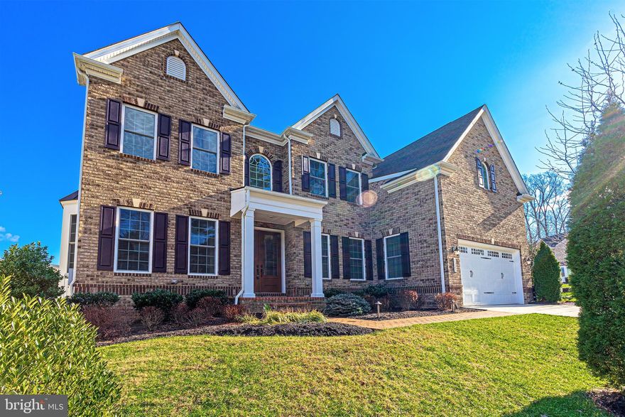 * Turn Key Opportunity * A Designers Masterpiece ** This Original Owners Home Has been Extensively Upgraded & Professionally Decorated ** Very Lightly Used   So Truly Feels Like New Home ** This House & Garden Inspired 5 bedroom, 5.5 bath Former Model Home Delivers over 5,700 square feet of living space on 4 finished levels  - Too Many Upgrades to List -  Stately Brick Exterior w/ Covered Porch Entrance  - Custom Landscapes and Lighting  - Large Sundeck, Paver Patio with Firepit. Beautiful 2 Story Foyer Leads you in to a Bright Open Floor Plan,   Dramatic Family Rm w/ Soring  Coffered Ceilings & Walls of Windows - Custom Architectural Finishes Throughout  - Intricate Millwork & Hand Scraped Hardwood Floors  - Designer Gourmet Kitchen  - Luxurious Owner's Suite    and a "One Of A Kind" Lower Level will Make this Home Feel like a Dream. Oversized Bay Window Highlights the Crisp Crown molding -  The Large Formal Dining Rm is Stunning in Design & Details, and is Accented by Custom Wainscoting and a Tiered Chandelier that adds an Extra level of Refinement. A Convenient Butler's Pantry Complements the Gourmet Kitchen Designed with Family Interaction in Mind  - Imported Stratus White Countertops -  Custom Backsplash & Glass-front Cabinetry -  Spacious Walk-in Pantry  -  Custom Range hood  - The Sunny Bright  Breakfast Area is ideal for Daily Dining while Overlooking the Beautiful Patio & Maintenance free Deck Stately Library w/ Custom Wall of Built-ins Makes the Perfect Home Office -  Large Mudroom w/ Cubbies and a Planning Center -  Convenient Bedroom Level Laundry Room -  Owner's Suite is Finished w/ Deep Tray Ceiling   2 Large Walk-in Closets   luxurious En Suite Bath featuring His and Hers Granite Topped Vanities   Sumptuous Soaking   Frameless Glass Shower with Bench The Finest Craftsmanship and Detail to Design in this Perfect "Walkup" lower level  Oasis Complete with Game Rm  - Media Rm -  Exercise Rm  - Huge Recreation Rm with a Custom Granite Wet Bar -  Beverage Refrigerator  - Dishwasher -  A Magical Theatre-style Tiered Media Rm with Bose 5.1 Surround Sound, and a Huge Home gym complete w/ Beverage Station and Custom Cabinetry  - A Den w/ Walk-in Closet & Full Bath on this level makes an Excellent Guest Quarters/Au Pair Suite. This  Dream Home has Whole-house Audio Throughout the 4 Levels -  Intercom  - Security System  - Dual Gas Heating Zones  - Gas Water Heaters  - Beautiful Landscape Lighting & Lawn Irrigation, all on a professionally landscaped Lot A commuter's dream   Just 1 block from Rt. 7   I-66   Just Minutes to 2 Metro Stations   Tyson's Corner   Downtown Falls Church   Variety of Shopping, Dining and Entertainment Choices Right Outside your Door!
