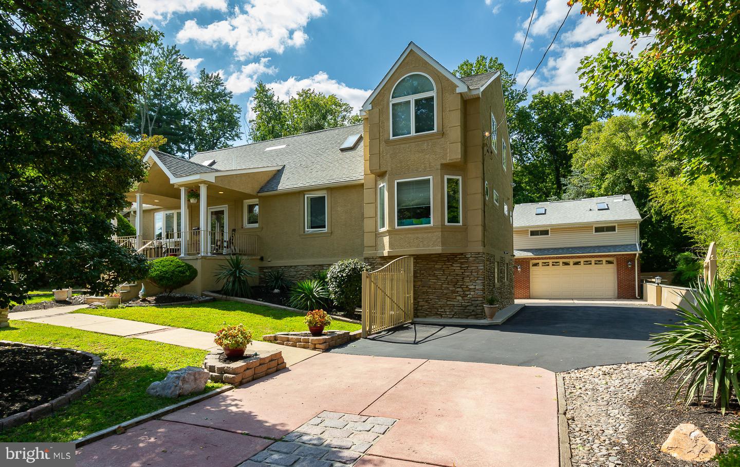 Welcome to 120 S Sproul rd in the highly sought after town of Broomall. This beautiful 5 bedroom, 3.5 bath updated home must be seen in person to believe, the pictures just do not do it justice. The front door opens to a lovely family room which is open to a very large eat in kitchen with updated cabinets, granite tops, and gorgeous hardwood flooring. Just off the kitchen is an amazing dining room/family room with updated gas fireplace with french doors overlooking the backyard pool and paradise.
Included on the first floor is a huge master suite complete with sitting area, office, and incredible walk in closet. The second floor has 4 large bedrooms and a lovely full hall bath.
The walkout basement has several rooms for entertainment and extra living space. There is a bar area with gorgeous tile floors and a half bath, laundry room with an attached office. Also adjacent to the bar area is a super cool movie room with screen and theatre seats. The extra family room in the basement is a great get away area to relax and read a book.
The garage has been converted into a lovely in-law suite with separate utilities.