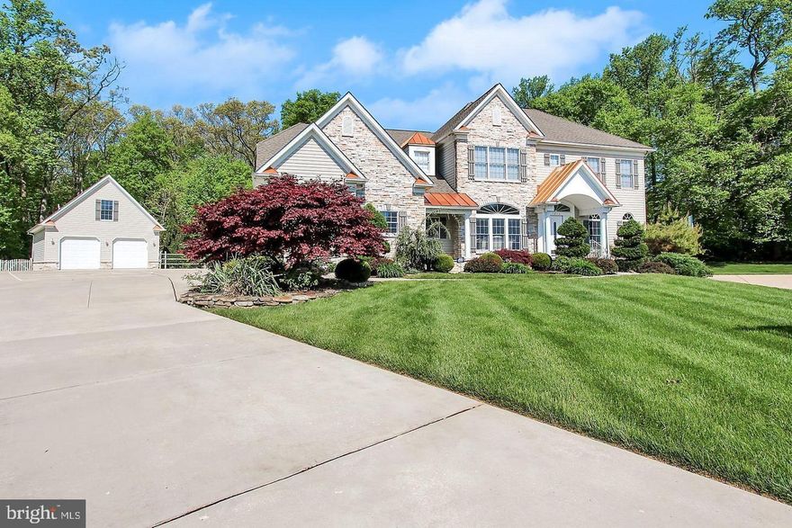 More details and photos coming soon! Stunning custom-built stacked stone colonial in sought-after Fox Chase offering three levels of exceptional living space. Designed for both everyday comfort and entertaining, this home features five fireplaces and expansive indoor and outdoor gathering areas. The kitchen is a true showpiece with granite countertops and high-end finishes. A luxurious main-level primary suite provides convenience and privacy, while an upper level primary suite and a full lower level separate in-law/nanny suite with private entrance offers incredible flexibility. Step outside to a resort-style setting with a huge pool, complemented by elegant paver stone patios, gazebo, pool shed and level yard. Car enthusiasts and hobbyists will appreciate the five garage spaces, including a detached two-car garage with office and half bath. A rare opportunity in an established Bel Air community.