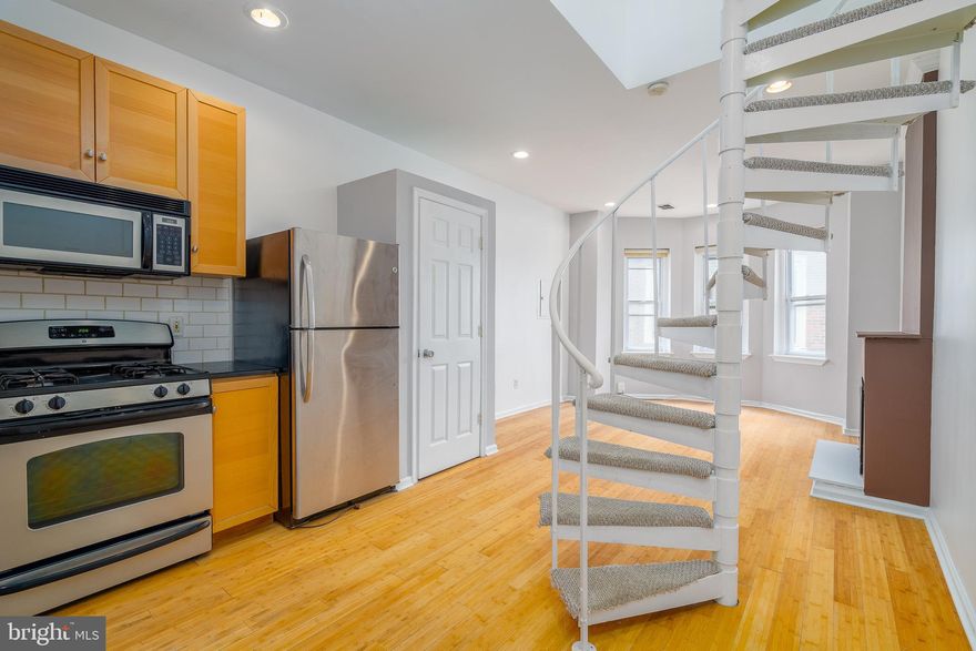 744 s 22nd St #2B is a bright and airy 1 bedroom, 1 bathroom, bi-level apartment on the top floors of a quadruplex in Philly's sought-after Graduate Hospital neighborhood. Highlights include central air conditioning, in-unit laundry, and a private balcony. The main level is open and full of natural light with hardwood floors and recessed lighting. Character is displayed in the bay windows and the gas fireplace that anchor the living room. The kitchen has a full suite of appliances, including a dishwasher and laundry closet. Upstairs, the large carpeted loft-style bedroom is equally sunlit. It has an updated full bathroom with a jacuzzi tub, a generous closet, and a peaceful balcony. 744 S 22nd St's fantastic location earns a Walk Score of 94! Graduate Hospital is overflowing with friendly shops, top-rated restaurants, and local markets to explore. It's also a short stroll to the extensive Schuylkill River Trail and idyllic Rittenhouse Square. Plus, there's easy access to public transit, the University of Penn, and I-76. Schedule your in-person tour today! $1,600.00/ month plus $35.00/ month/ occupant for water.