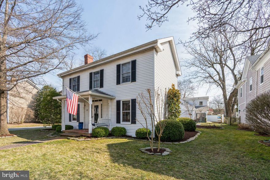 Beautifully renovated St Michaels Colonial, 3 bedrooms, 2 ½ baths, a short walk to shops, restaurants, and historic St Michaels harbor and the Chesapeake Bay Maritime Museum. This classic home features a lovely open living and family area, separate dining room and bright airy kitchen with lovely skylights. The second floor features a large primary suite and spacious guest room and bath with lovely hardwood floors throughout. Skylights brighten the central stair that features handcrafted cherry bannister and railing providing warmth and charm. The large detached garage remodeled in 2017 offers an additional independent living space. The 2 ½  car  garage features ample storage as well as a large finished ground level living space that may be used as a workshop or additional family room with exterior access. The second floor of the garage features a spacious additional family living area with separate bonus storage room and an additional large bright bedroom/office with full bath. This home is one block from the Domingo Creek dock and kayak launch, bike path and Waterfront Park, a great location to sit by the water, ride bikes and especially kayak fish or fish from shore.