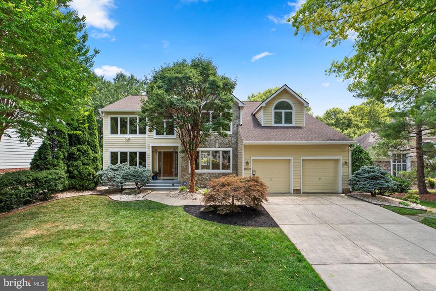 This exceptional home boasts over 4,200 sqft of beautifully finished indoor and outdoor living spaces, including 5 bedrooms, 4 full bathrooms, and 1 half bathroom, with picturesque views of the 3rd fairway at Hobbits Glen Golf Course. Step into the expansive main level, where stunning hardwood floors lead from the grand foyer with its soaring ceilings into a series of elegant spaces, beginning with French doors opening to the formal living room, the dining room leading to the eat-in kitchen and breakfast area that flows into a family room featuring cathedral ceilings, a wood-burning fireplace, custom built-in shelving, and floor-to-ceiling windows with breathtaking golf course views.

The main level also includes a convenient half bathroom and laundry room, a study or office accessed through French doors, and a sunroom with patterned tile floors and outdoor access. The stunning kitchen is a chef’s dream, featuring ample 42” cabinetry, a center island, a breakfast bar with seating, stainless steel appliances, granite countertops with a matching backsplash, a butler’s pantry, a gas range, and elegant pendant lighting. The large breakfast area, with slider door access to the enclosed screened porch, showcases a stunning mahogany ceiling, tile floors, a ceiling fan for comfort, golf course views, and direct access to the deck—ideal for seamless indoor and outdoor dining experiences.

The luxurious owner’s suite features elegant hardwood floors, two spacious closets, and an exquisite en-suite bathroom with dual custom vanities, a lavish soaking tub, and a separate shower with gold finishes. The upper level also includes three generously sized bedrooms with hardwood floors, one with its own private full bathroom, and an additional full bathroom for added convenience. The fully finished lower level is an entertainer's paradise, featuring an expansive carpeted recreation room complete with a wet bar, perfect for hosting gatherings. This level also includes an additional bedroom with an en-suite full bathroom with multiple entries, a bonus room with wall-mounted mirrors ideal for a home gym, and abundant storage space.

A large deck for outdoor dining and entertaining overlooks the lush, well-maintained backyard bordered by a charming wooden fence and framed by mature trees backing to the 3rd fairway. This prime location features convenient access to shopping, dining, and recreational facilities such as Wilde Lake Park, the Columbia Swim Center, and Hobbits Glen Golf Club. The area offers ample green spaces, community amenities, easy access to Route 29 and I-70, and entertainment options like The Mall in Columbia and Merriweather Post Pavilion.