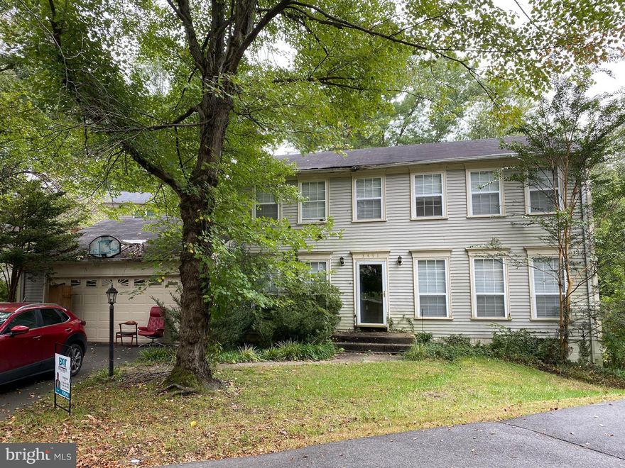 This home would be good for an investor to flip, or someone who can live in it while working on condition at the same time. House being sold "as is" and needs renovated including a new roof and kitchen needs gutted. There are some wood floors and some flooring than can be saved, but kitchen floor and other floor also needs replaced. 
There is a foreclosure that we are in the processing of trying to stop with a contract, so we will accept the best contract as soon as possible. No contingencies please, as we don't have time.  We are also discussing a possible short sale, as the payoff is currently unknown.
Home is located in Lake Ridge which is located conveniently close to all support facilities such as shopping, schools, churches, and employment centers. Pipe stem lot is private and backs up to common areas and walking trails. We are in process of confirming HOA dues and repairs.
Home has 5 bedrooms and 3.5 bathrooms, including basement finished area. 2 car garage.
Heat pump is about 6 years old and is in working order. All plumbing is in good working order. Only 1 outlet in the garage is known to not work and the issue is suspected to be related to a fuse/breaker.

Seller is in process of clearing items out of the home and we apologize  for showing condition.