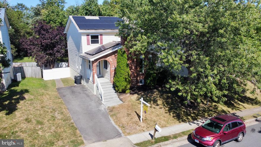 Nestled in the serene enclave of Sterling Park, this exquisite Colonial-style residence offers a harmonious blend of elegance and comfort, perfect for those seeking a refined lifestyle. Spanning 2,728 square feet, this meticulously maintained home features four spacious bedrooms and four luxurious bathrooms, ensuring ample space for relaxation and privacy. Step inside to discover a warm and inviting interior, freshly painted and thoughtfully updated, where the combination of plush carpeting, sleek ceramic tile, and luxury vinyl plank flooring creates a welcoming atmosphere. The heart of the home is the expansive family room, seamlessly connected to the kitchen equipped with stainless steel appliances, including a built-in microwave, cooktop, and wall oven. The thoughtful design includes a second kitchen, ideal for entertaining or culinary adventures. Natural light pours in through well-placed windows, highlighting the recessed lighting and ceiling fans that enhance the home's ambiance. The cozy wood-burning fireplace serves as a focal point in the living area, inviting you to unwind after a long day. The combination dining/living area is perfect for both intimate dinners and larger celebrations, while the pantry provides ample storage for all your culinary needs. The fully finished basement offers additional living space, complete with an outside entrance and walkout level, perfect for guests or as a private retreat. For added convenience, laundry facilities are available on both the upper floor and in the basement. Step outside to your own private oasis, where the rear yard backs to lush trees, providing a tranquil backdrop for outdoor activities. Enjoy the fresh air on the expansive deck or patio, perfect for morning coffee or evening gatherings under the stars. The property also features a charming shed for additional storage. With an asphalt driveway and off-street parking, accessibility is never a concern. Security features, including smoke detectors and exterior cameras, ensure peace of mind. Ideally located, this home is just 15 minutes from Dulles Airport and close to shopping centers, making daily errands and travel incredibly convenient. This home is not just a residence; it's a lifestyle. Experience the perfect blend of luxury and comfort in a setting that feels like a retreat, all while being conveniently located near the amenities of Sterling Park. Embrace the opportunity to make this exceptional property your own.