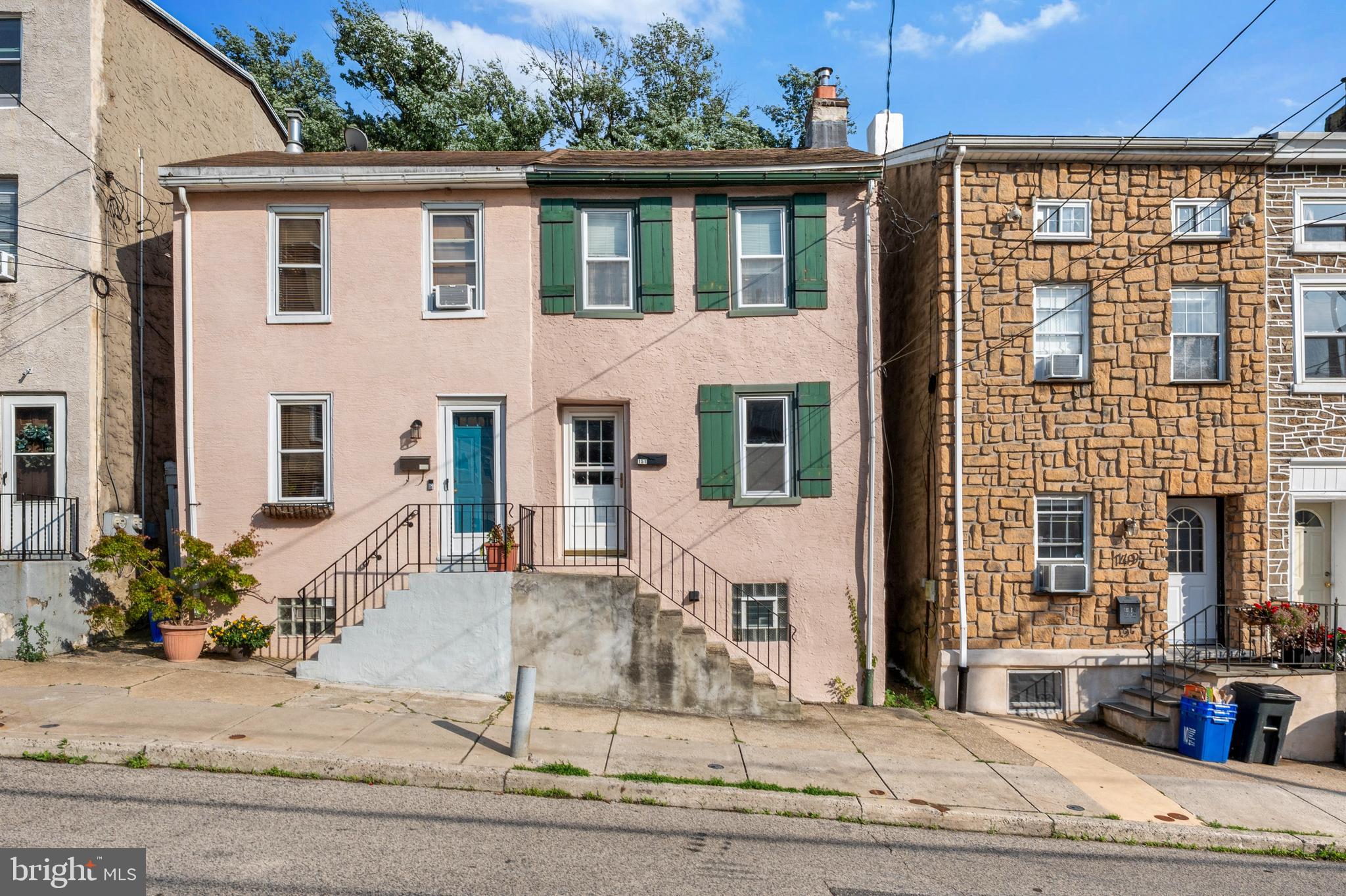 Welcome to 151 Fountain Street, a well-maintained home in the heart of Manayunk. The main level features hardwood floors, high ceilings, and natural light throughout. A spacious living room flows into a dedicated dining area, and the eat-in kitchen offers ample cabinetry, counter space, and access to a fenced backyard. Upstairs are two bedrooms and a full bathroom. A brand new furnace was installed in 2024. The unfinished basement includes laundry hookups and storage. Located within walking distance to Pretzel Park, Main Street, and regional rail, this home offers convenience and value in a sought-after location in the heart of Manayunk.