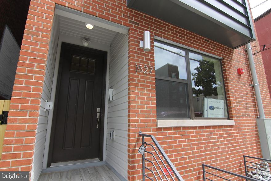 Beautiful bi-level 2 bedroom 1 bath condo in the highly desired Old Kensington neighborhood. This charming modern 1st-floor unit has central air, solid hardwood floors throughout, and all the creature comforts you desire. The living and dining area is wide open, open concept, and filled with natural sunlight with plenty of room for furnishings and entertaining. The kitchen features: state-of-the-art stainless steel appliances, a breakfast bar, and white shaker-style cabinets. Downstairs: incredibly cozy with two spacious, well-lit bedrooms with recessed lighting and ceiling fans. There is also a generously sized laundry room, an expertly tiled 3-piece bath with dual sinks, and a soaking tub/shower combo. The building is close to everything in South Kensington, Fishtown, and Northern Liberties, near parks, cafes, and shopping. Pets are allowed on a case-by-case with a refundable pet deposit. The tenant pays for all utilities. $60 flat fee for water charged monthly. Pets are welcome with a $495 non-refundable fee. We welcome your visit today! Requirements: Applicants to make 3x the monthly rent in verifiable net income, credit history to be considered, no evictions within the past 4 years, and must have a verifiable rental history with on-time rental payments. Exceptions to this criteria may exist under the law and will be considered.