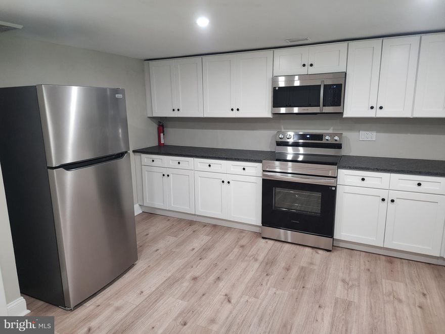 Welcome to 2 Steidler Lane – a beautifully updated 4-bedroom, 1-bath rental offering comfort, space, and modern conveniences. Set on a serene lot with a full private backyard, this home features a spacious layout, a neutral color palette, and quality finishes throughout. The large kitchen is a standout with its white shaker cabinets, coordinating stainless steel appliances, and ample room for cooking and dining. Hardwood floors flow through the main living areas, while cozy carpet adds comfort in each of the bedrooms. You'll also find a convenient linen closet and washer/dryer hookups. Brand new HVAC system for year-round comfort, New septic and well systems keeping utilities low. Shared garage with one designated parking space. Pets considered on a case-by-case basis (no large dogs). Rent: $2,000/month + utilities. No vouchers accepted. Don’t miss your chance to live in this inviting home with a private outdoor space perfect for relaxing or entertaining. Schedule your showing today!