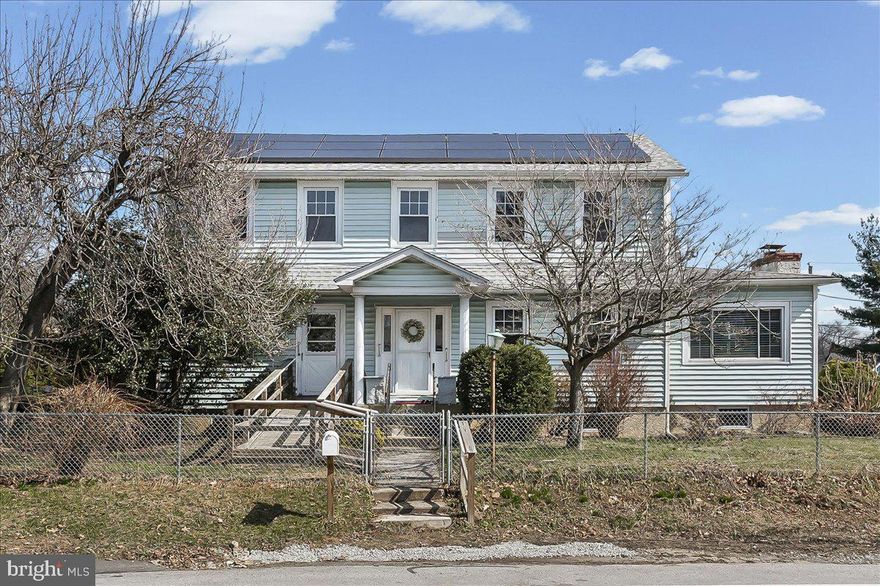 What a big, just sprawling, farmhouse on almost 1/3 of an acre. This longtime owner lovingly raised their family here since 1970! This is a true 5 bedroom home, with 2 primary suites, one on the first floor with a stall shower, and big walk in closet, plus an outside entrance with handicapped accessible ramp. Country kitchen is older, but very clean and functional with a pantry, built in ironing board and tons of other little hidden storage spaces!  The amazing living room and family room/dining rooms are versatile, can be tailored to fit a variety of uses. There is a beautiful brick fireplace (needs a new liner...) for a focal point of your decor. Original hardwood floors, in good condition, are throughout most of the home. Up the wide, ornate staircase  to a  full second floor. The second primary suite has cathedral ceilings, a walk in closet, ceiling fan and an updated private bath.  There are 3 more generously sized bedrooms, plus a small "sewing'' room or additional walk in closet. The hall bath (full bath #3!!!) is extremely large for an older home! There is a full basement, with a laundry room and outside entrance. Plenty of storage and utility areas. This is an estate, but family states that the heater, water heater and oil tank are about 3 years old. There are replacement windows and the roof was replaced about 10-12 years ago.  The solar panels are leased at $125/m which is a huge benefit for a big house and rising Peco prices. When heading to the fenced back yard, they always use the rear entrance on Plum, through the enclosed back porch. What a great property with a shed, totally useable above ground pool (newer pump) and back patio! There is parking for at least 6 cars, plus an older driveway if you were to open the gate and pull in.. This a great value, clean and in move in condition.  Priced for an "as is" sale, but you can absolutely live here while making it your own! ,  Close to all major highways, I -95, 476 and DE Tax Free Shopping! This property has many possibilities for muti-generaltional living, in-law suite possible, home office or whatever your preferences are, must see if you are looking for living space and great back yard!