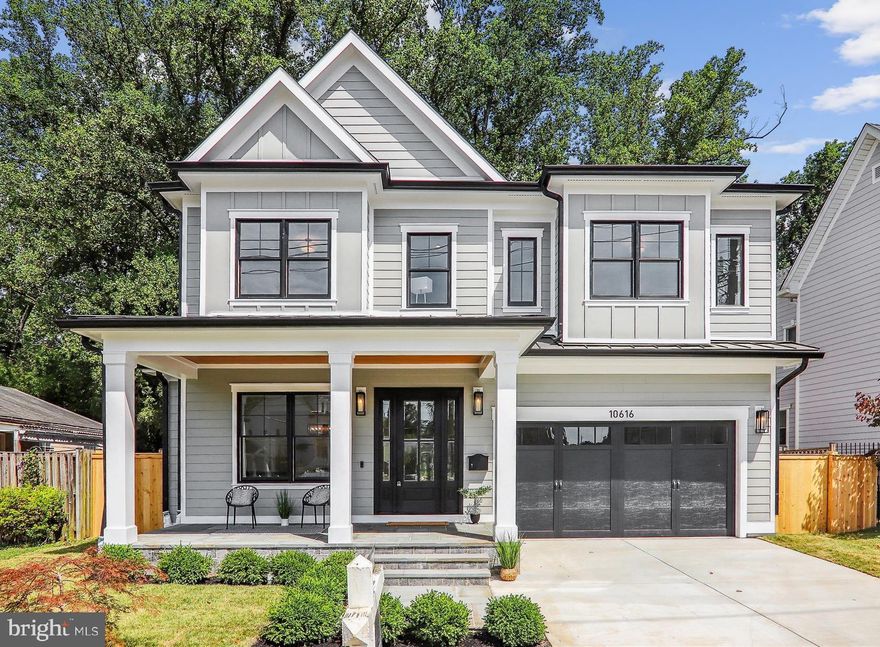 Welcome to 10616 Parkwood Drive - a stunning, modern farmhouse in the heart of Kensington! This brand new home has everything you're looking for in new construction. It features a practical, open floor plan with beautiful finishes and meticulous attention to detail. With approximately 5000 sq. ft. of living space over three levels, it offers plenty of room to spread out and enjoy.

Inside, you'll find gorgeous white oak floors on the main and upper levels, along with Andersen windows and custom light fixtures. The main level welcomes you with an inviting covered front porch, a sun-filled living room, a formal dining room and a huge gourmet kitchen overlooking the family room.  You will love the practical butler's pantry, connecting the family & dining rooms! The garage opens into a spacious mudroom with cubbies and built-ins, blending convenience with style. 

The highlight on the upper level is the impressive primary suite, boasting tray ceilings, large windows with park views, three custom walk-in closets, and a luxurious, private bathroom with a walk-in shower (with 2 shower heads), dual sinks and a freestanding tub overlooking Rock Creek Park.

Upstairs, there are 3 additional bedrooms and 2  full baths, a wonderful sitting/reading/den area, plus a convenient laundry room. The lower level adds even more versatility with a great room, a large wet bar, game area, yoga/exercise room, and a spacious guest suite. 

Outside, a lovely flagstone patio overlooks a private backyard that backs onto Rock Creek Park, offering a perfect retreat.

Located just outside the Beltway, the home provides easy access to major commuter routes. It's also within walking distance to KP Elementary School, Rock Creek Park, and Kensington's charming downtown area with its shops and restaurants. Bethesda and Washington, DC, are just a short drive away, making this home a perfect blend of luxury, comfort, and convenience.