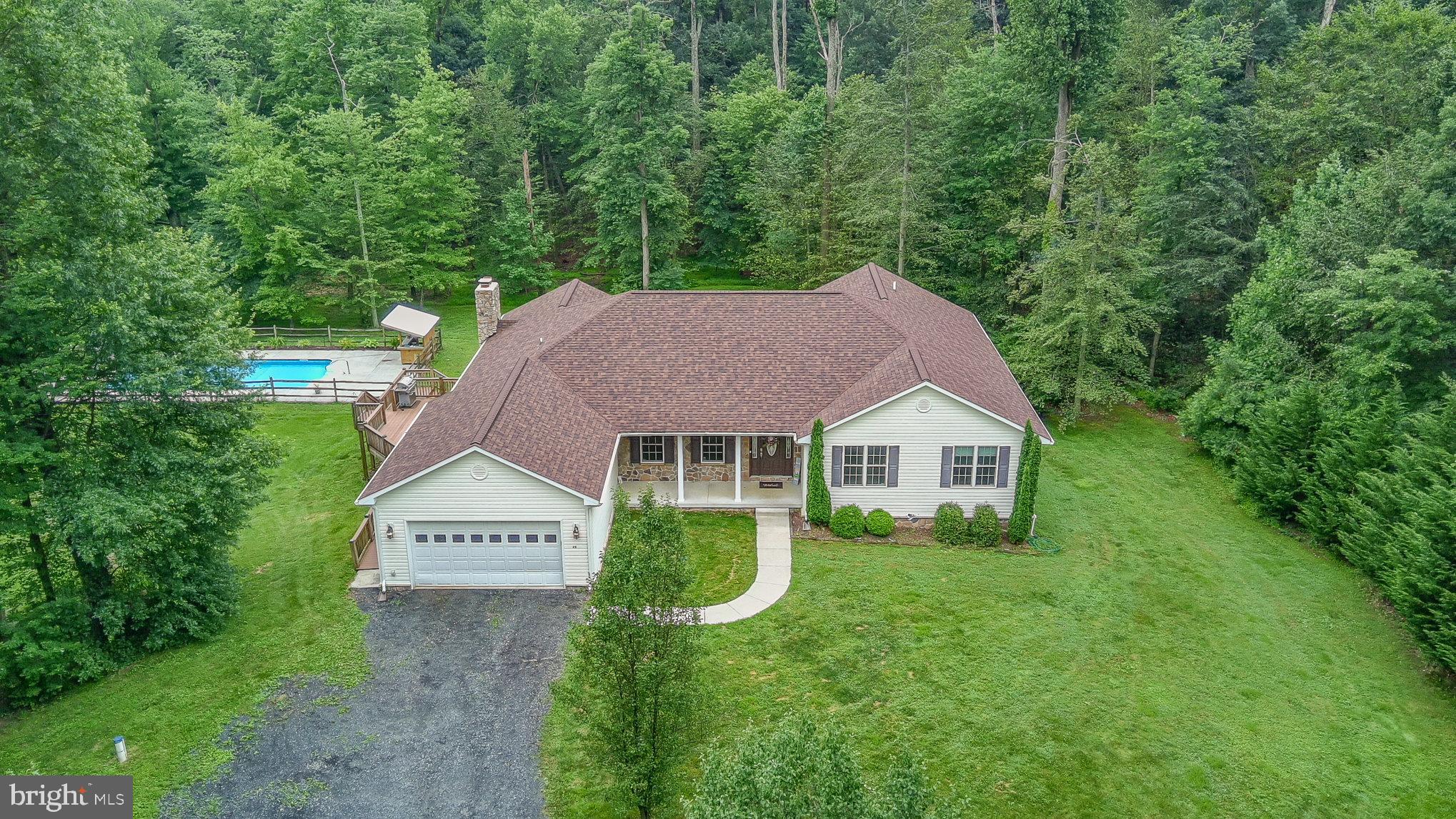 Spacious Rancher on Over 6 Acres with 5,200+ Finished Sq Ft, and Inground Pool!
Welcome to this stunning ranch-style home offering over 5,200 finished square feet of comfortable living space, all set on a peaceful 6+ acre lot. Designed for both everyday living and entertaining, this property offers the perfect blend of space, functionality, and luxury.
The main level features a spacious primary suite complete with a jetted tub and separate shower, along with three additional bedrooms. The beautifully updated kitchen includes a large island with breakfast bar seating, stainless steel appliances, and ample cabinetry—ideal for both cooking and gathering.
Downstairs, the expansive walkout basement is built for fun and relaxation. It includes a wet bar, pool table, shuffleboard table, and generous open space to entertain. A dedicated theater room provides an exceptional setting for movie nights or sports viewing. You'll also find a private bedroom and full bathroom—perfect for guests, in-laws, or a home office setup.
Step outside to your private backyard retreat featuring an inground pool and a large patio directly accessible from the walkout level—perfect for warm summer evenings. A spacious 3-car garage rounds out this exceptional property.
Don't miss the opportunity to own this one-of-a-kind home that offers room to grow, play, and unwind—inside and out.