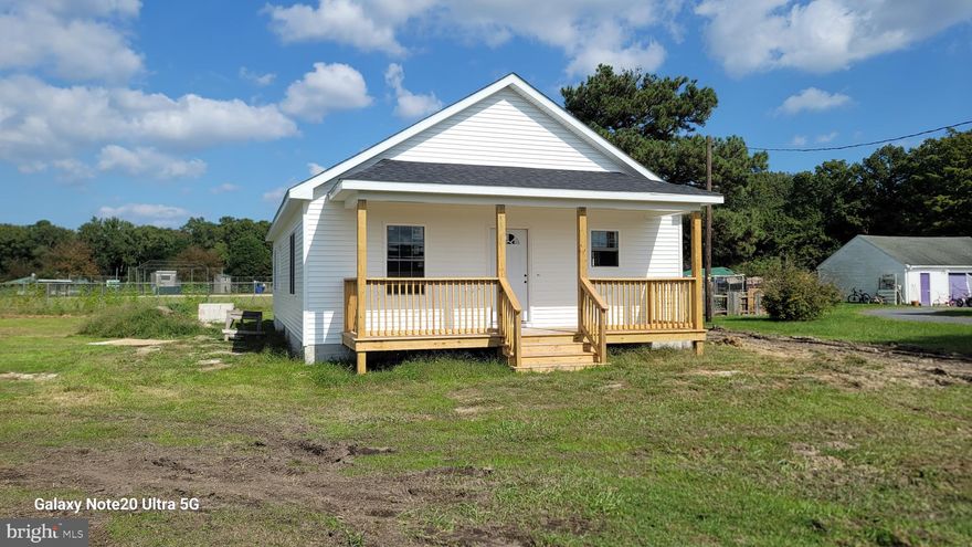 This home is located just minutes from Ocean City, Assateague and points north and south in lower Delaware or Coastal Delaware. It is around the corner from the Willards Elementary School, and the Eastside Park is just a hop, skip, and jump away! This Three bedroom 2 bathroom home, will  feature granite countertops, stainless appliances in kitchen, washer & dryer (white). Ceiling fans with lights in most rooms and hard surface flooring in the entire home except for the bedrooms which, will be carpeted. This home will also boast a 6 x 23 front porch, architectural shingles, side landing & entrance, mechanical room. Completion expected mid Fall.