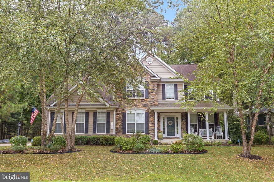 Nestled in the prestigious Swan Point community, with access to water and a golf course, this exquisite Colonial residence offers a harmonious blend of luxury and comfort, perfectly designed for an elevated lifestyle. Spanning 2,980 square feet, this meticulously maintained home boasts four spacious bedrooms (each with walk in closets) with a huge primary bedroom, and two and a half elegantly appointed bathrooms, plus a home office, ensuring ample space for relaxation and entertainment. The interior features a traditional floor plan adorned with crown moldings and chair railings, creating an inviting atmosphere. The gourmet kitchen, complete with an eat-in area and table space, is a culinary enthusiast's dream, equipped stainless steel appliances including a self-cleaning oven, dishwasher, and microwave. The adjoining family room, warmed by a stunning gas fireplace with glass doors, provides the perfect setting for cozy gatherings. Natural light floods the home through insulated windows, enhancing the beauty of the luxurious wood floors and tile accents throughout. The primary bath offers a serene retreat, while the additional bedrooms -each with walk in closets, provide versatility for guests or a home office. Thoughtful details such as window treatments and a dedicated laundry area elevate the living experience. Outside, the allure continues with a beautifully landscaped meticulously maintained yard on a generous 0.34-acre lot. Enjoy the tranquility of scenic vistas featuring views of the Potomac River and lush trees, creating a picturesque backdrop for outdoor living. The patio and porch areas invite you to unwind or entertain in style, while the underground lawn sprinkler system ensures your outdoor oasis remains vibrant year-round. As part of the Swan Point community, residents enjoy exclusive access to a boat dock/slip and ramp, perfect for water enthusiasts. The community pool offers a refreshing escape during warm summer days, while the association takes care of common area maintenance and snow removal, allowing you to focus on enjoying your luxurious lifestyle. With convenient garage and off-street parking for up to six vehicles and a prime location just blocks from the river, this home is a rare gem that combines elegance, comfort, and an active lifestyle. Experience the best of waterfront living in this stunning property, where every detail has been thoughtfully curated for your enjoyment. Embrace the lifestyle you deserve in this exceptional home. Golf course extra.