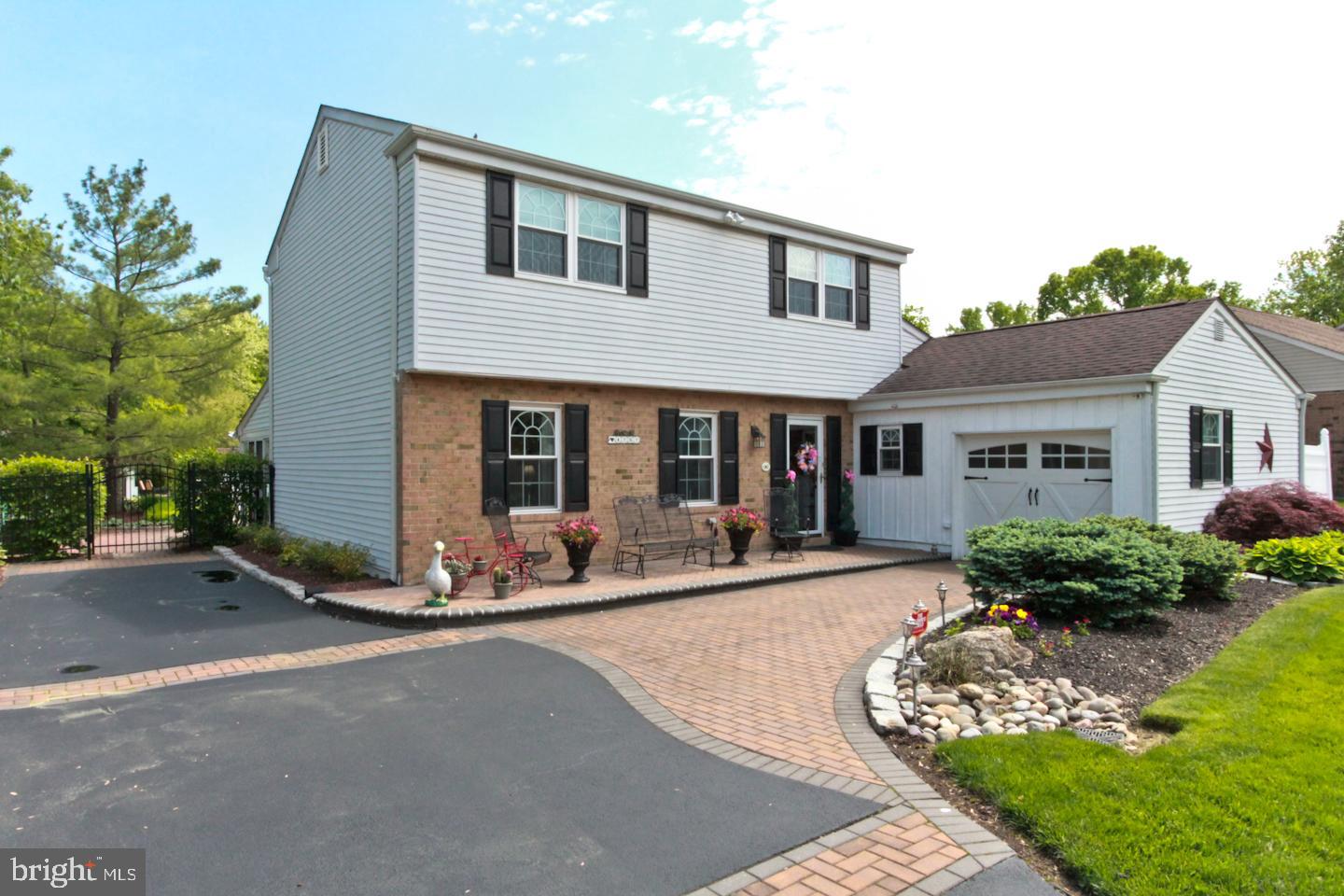 Absolutely beautiful! When you pull up to this house, you know you're about to see something special. Elegant gardens, paved driveway and front porch, quiet cul-de-sac street... all create a very attractive curb appeal. House has 4 bedrooms, 2.5 bathrooms, including an in-law suite on the first floor with a full bathroom. Kitchen has been expanded and has newer cabinets, granite countertops and stainless-steel appliances. Next to the kitchen is a large, sun-filled family room. Living room has a beautiful gas fireplace, crown molding and recessed lights. Upstairs you will find 3 large bedrooms and a full bathroom. From the kitchen, enter into a fabulous Florida Room with 2 ceiling fans, where you can host summer BBQs or just simply relax and enjoy the serene and private outdoors. Backyard is large, fenced, flat, has a beautiful in-ground pool, paved patio, gorgeous landscaping and gardens, large shed and a basketball court. This house is definitely special.  It has been well maintained and improved over the years and is in move-in condition. Make it yours today!