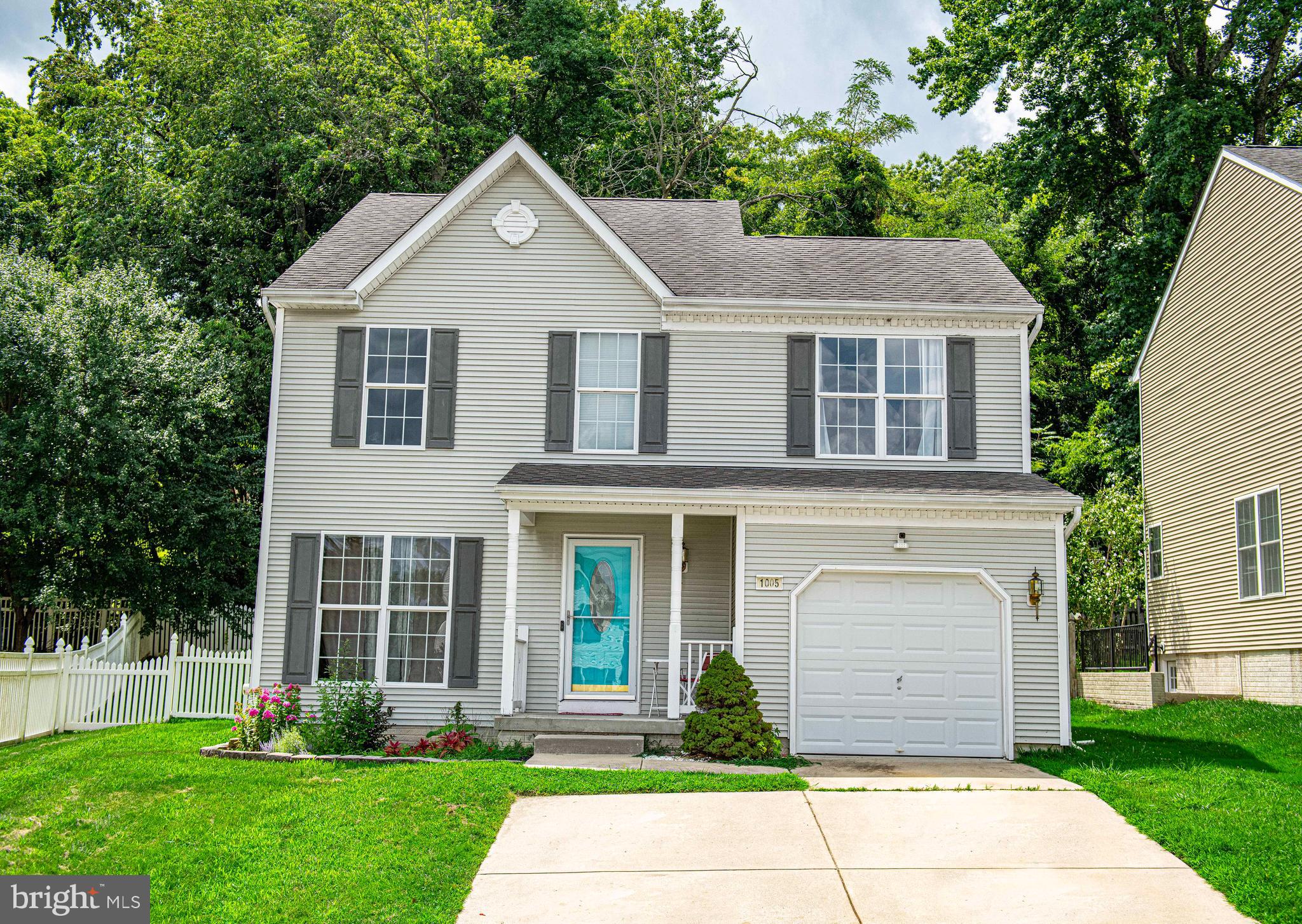 Welcome to Waterview at Long Bar Harbor! Tucked away on a quiet cul-de-sac, this Colonial offers a comfortable and inviting layout. Step into the bright living room featuring hardwood floors, neutral colors, and a ceiling fan, flowing into a separate dining area and a kitchen with stainless steel appliances & natural wood cabinetry. A sliding door off the kitchen opens to a fully fenced backyard with a patio, backing to trees—perfect for relaxing or entertaining. The main level also includes a convenient half bath. Upstairs, you’ll find the spacious primary suite with hardwood floors, a walk-in closet, and a private bath with double vanity, soaking tub, and walk-in shower. Three additional bedrooms and a full hall bath complete the upper level. The lower level offers a family room with a walk-up to the yard, a separate laundry area, and a storage room. An attached garage and two-car parking pad add to the convenience. This home blends comfort, functionality, and location—all in one! This home has great proximity to the water (Bush River) for boaters. Otter Creek & Flying Point Marina is nearby! This location also is a commuters dream with quick access to 40, 95, & other major travel routes. Close to Amtrak & APG!