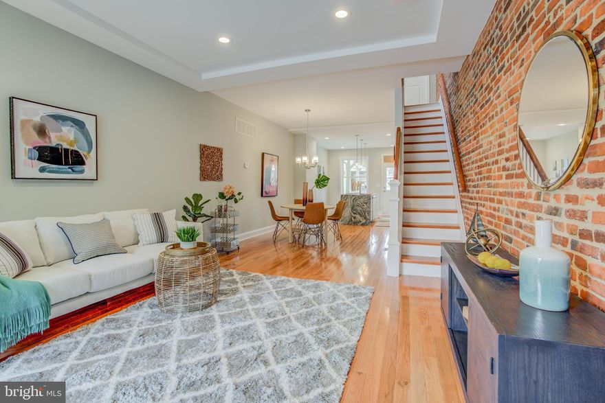 REDUCED $20K!!! Gorgeous new TLC CHAP renovation in Brewers Hill Estimated tax credit of approximately $5900.00!!!!.  This one has everything! 4Beds, 3 baths, granite, stainless, hardwoods, roof deck, custom tile and trim packages, builder warranty and PARKING!!!  Basement has exterior walkout access.  Prime location close to major highways for commuting or walk to local brewery and restaurants. Final chap pending approval.