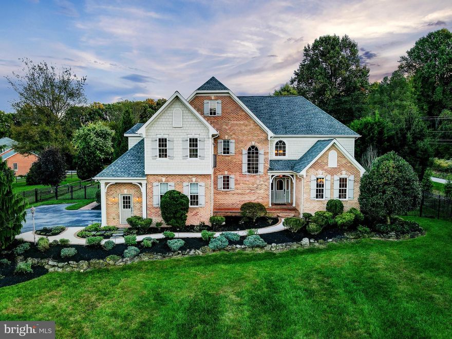 Stunning custom home in Beautiful Lutherville/Timonium. Open floor plan with luxurious designer features throughout.  Relax in the two story great room in front of your gas fireplace with french doors to the outdoor patio. Gourmet kitchen with two tone cabinets and granite counter tops, high end stainless steel appliances, range hood with custom cabinetry and walk in pantry. Eat at the oversize kitchen peninsula overlooking the great room living area, equipped with a built in wine fridge, or at the dining morning room in front of the light filled bay window looking out over the patio. Main level owner's suite with cathedral ceiling, gas fireplace, corner spa bath, heated floors, walk in closet. Spacious finished basement lower level with 9ft ceilings, office, full oversized bedroom suite, with full bathroom and living area with wet bar. Two car side garage, and flat landscaped backyard. Truly peaceful, convenient location. This one is ready for you!