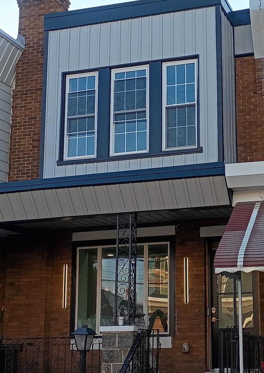 Welcome to 1320 N. 26th Street, a fully renovated, modern, and thoughtfully designed townhome located in the heart of Brewerytown, one of Philadelphia’s fastest-growing neighborhoods. The home features a bright, open-concept layout on the main level with plenty of recessed lighting which flows seamlessly into a contemporary kitchen with all new cabinetry, granite countertops, and stainless steel appliances. The kitchen island also features an integrated glass fireplace! Enjoy the exposed brick in the living room space complete with a unique, modern tray ceiling design. This home also features hardwood flooring throughout. The home heating and cooling provided via the ductless mini split systems that can be adjusted to individual comfort levels. Upstairs find three elegant bedrooms with recessed lighting and ceiling fans, and a contemporary hall bath. The primary bedroom has plenty of natural light, another glass fireplace, and a tray ceiling as well. Below, in the lower level, you’ll enjoy the convenience of a finished basement with another full bath adding an additional 460 square feet, perfect for entertaining or relaxing. Total finished square footage is 1,408 square feet.  Ideally located near Fairmount Park, museums, many neighborhood attractions, numerous pubs, breweries,  restaurants, and public transportation, with convenient access to Center City, major universities, and all highways. Come and experience all the amenities and workmanship this beautiful townhome has to offer! 
Seller is a licensed real estate broker.