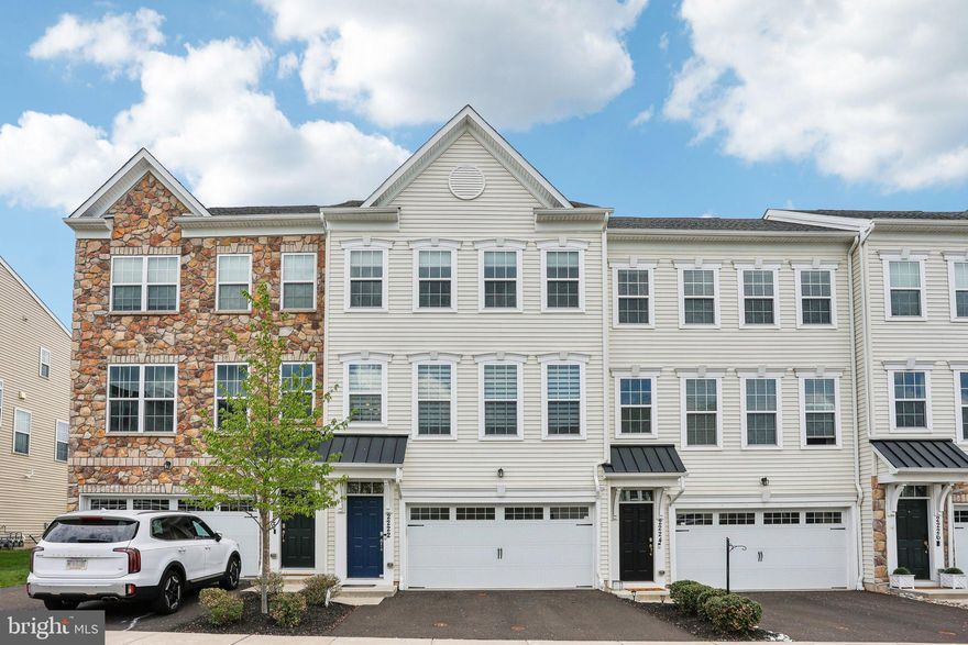 Welcome to effortless living in the heart of Warrington’s desirable High Grove community—From the moment you arrive, the Premier Kennedy Model sets itself apart with the main living floor that stuns with a seamless flow and sun-drenched spaces, recessed lighting and 9 foot ceilings. The engineered hardwood elevates the entire floor. The heart of the home is the expansive eat-in kitchen—designed for both everyday living and entertaining—with crisp white 42” soft-close cabinetry, gas cooking w/added griddle, an oversized granite island with extra deep stainless sink, stainless appliances, and plenty of room for gathering, Just off the dining area is a cozy nook offering the perfect setting for, game night, or casual hangout space. There's also a bonus bump-out providing even more usable square footage for reading or relaxing, this leads to the maintenance-free deck ideal for outdoor relaxation.  This home's unique dual entry stairway adds some separation from the main floor and the lower level... Step inside the lower level and find engineered hardwood flooring, the perfect hideaway room for gatherings! Also a flexible bonus room awaits—ideal for a home office, guest bedroom, or creative studio. A powder room, large storage closet, custom shades, and access to the private patio complete this versatile space.
Upstairs, comfort and functionality continue with a well-planned layout. The spacious primary suite with sitting area is a true retreat, featuring two walk-in closets, ceiling fan, and a spa-like en-suite bath complete with a glass-enclosed shower and dual vanities—ideal for busy mornings or relaxed evenings. Two additional bedrooms, each with ceiling fans and custom shades, offer flexibility for family, guests, or a home workspace, and share a pristine full hall bath. The convenient upper-level laundry room adds a layer of ease to daily living—no more lugging baskets up and down stairs!
This home delivers the low-maintenance lifestyle today’s buyers crave—with the space, style, and location that make everyday living extraordinary where convenience, comfort, and style meet. This beautifully maintained townhome is tucked away in an HOA-managed neighborhood  with a 2 car garage, 2 car driveway, overflow parking and open space across the street It's just minutes from major roads, premier shopping, and top-rated dining, making it the perfect place to call home.