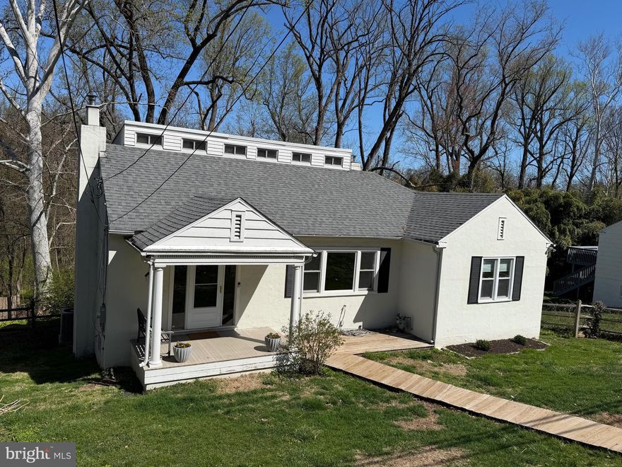 Welcome to 220 Balligomingo Road, a well-maintained home offering a peaceful, wooded setting with convenient access to suburban amenities.  The main level features a bright relaxing living room complete with fireplace, a spacious dining room ideal for gatherings, and a recently remodeled kitchen with modern finishes.  Adjacent to the kitchen, the sunroom provides additional storage space and access to the deck, creating a seamless flow for indoor and outdoor living.  Two bedrooms and a full bathroom complete the first floor, offering the option for main-level living. Upstairs, you’ll find a versatile loft/bedroom space suitable for a home office, guest room, or additional bedroom.  The finished walkout basement expands the living space with a large flexible area, an additional bedroom, and a laundry area. This level provides multiple possibilities including recreation space, home gym, or extra entertaining space.  Recent updates include a new 200-amp electrical service, new HVAC system, basement waterproofing with sump pump installation, kitchen remodel, and refinished floors.  There is a transferrable 10 year warranty on the HVAC system and lifetime of the structure warranty on the basement waterproofing system.  Conveniently located near the trolley station, major highways, shopping, and dining.