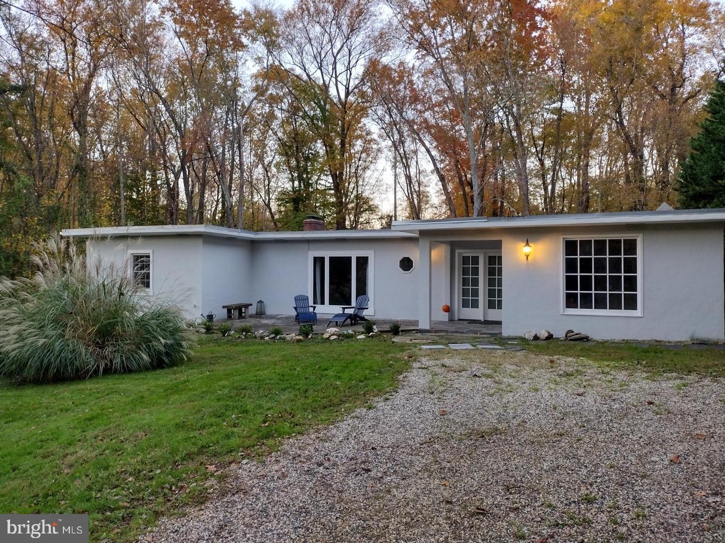 Lovely Contemporary Rambler property on a 1.38 Acre lot in Langley Forest and on a quiet cul-de-sac street. 4 Bedrooms and 3 full bathrooms with nice size closets. Separate Living Room, Family Room with fireplace and Dining Room. Primary bedroom has walk in closet and primary bath is beautifully updated. Large Eat in kitchen with table space and breakfast bar, SS appliances. Walking distance to Langley High School, a 3 minute drive to beautiful and convenient downtown McLean. Extremely private property backing and siding to the woods on two sides. Wonderful deck and BBQ area for entertaining. Long wrap around driveway ensures that your guests have plenty of parking. Natural light through out and cozy inside. Low maintenance tiled floors, just add rugs. Storage shed for storing. Rent includes mowing. Landlord prefers longer lease. Pets are case by case. Welcome Home!