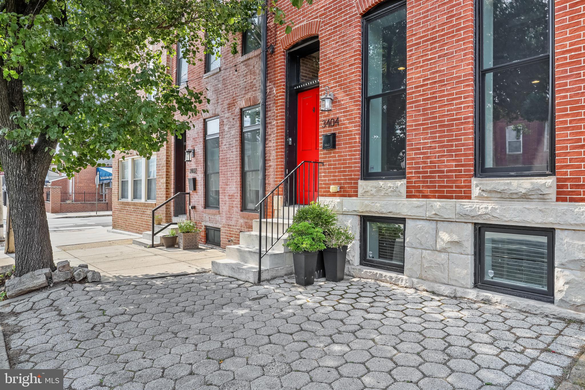 ONE OF A KIND CHAP TAX CREDIT RENOVATION IN PREMIERE CANTON LOCATION - this extraordinary 16' wide home is a seamless blend of historical preservation and modern amenities with a massive rear addition that offers nearly 3000 sq ft of living space with soaring 10' ceilings, hardwood floors throughout, crown molding & coffered ceilings, exposed brick and designer island kitchen with breakfast bar, commercial grade ss appliances, custom cabinetry, quartz counter tops, under cabinet lighting and tile backsplash with convenient half bath leading to large rear dining room, fenced in private patio & two car parking pad. The expansive upper level includes 3 bedrooms, 2 bathrooms, laundry room and wet bar with hallway access to roof top deck. Fully finished basement with two additional bedrooms - this one is a must see! 4 years remaining on the chap tax credit with almost a $9000/yr savings - current taxes only $4568!!!
