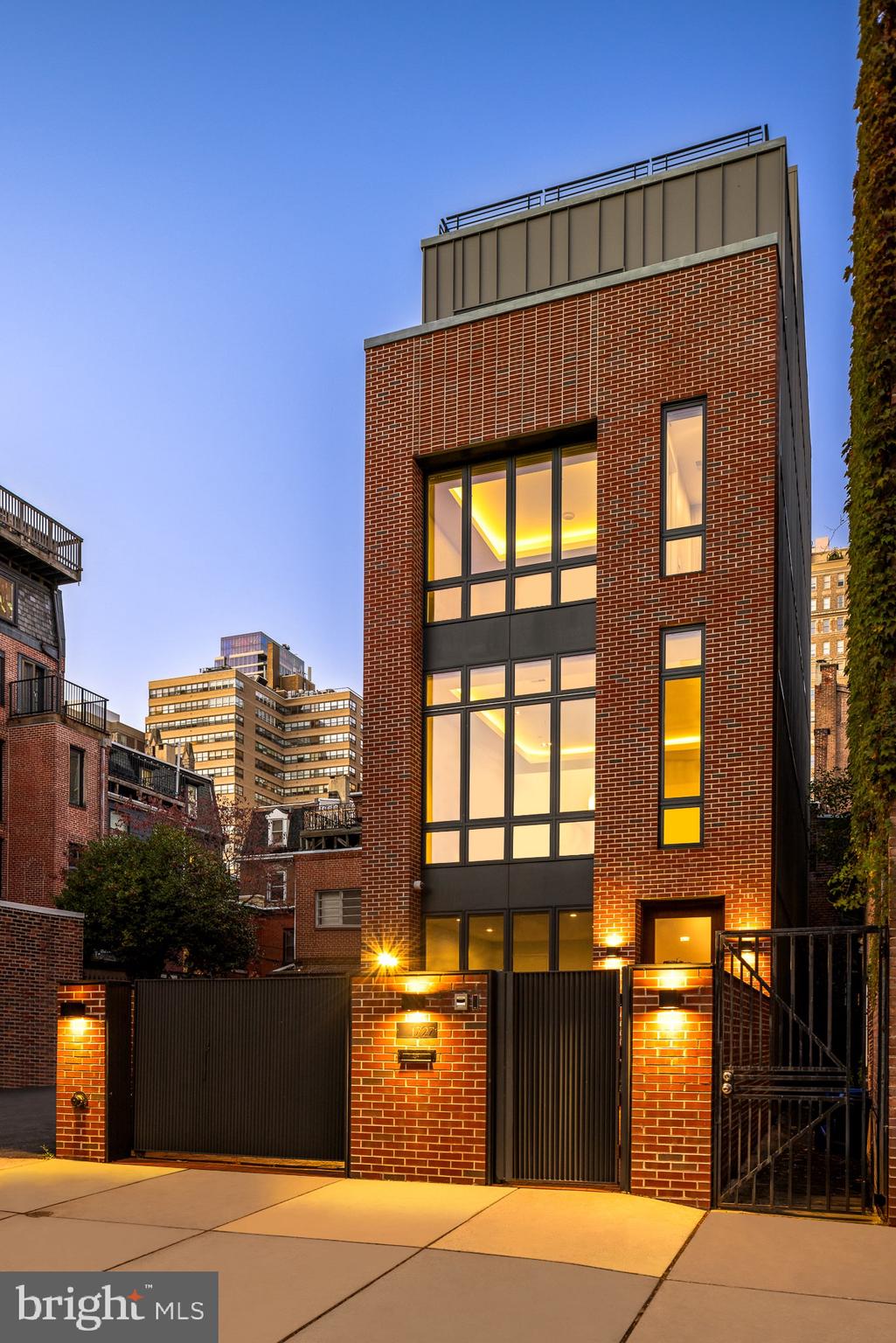 Welcome to 1727 Delancey Place, an exquisite contemporary residence nestled in the heart of Philadelphia's prestigious Rittenhouse Square. This rare opportunity offers a newly constructed townhome on historic Delancey Street, complete with tax abatement and private parking. Spanning 4,441 square feet of luxury indoor living, This ultra-modern home features five spacious bedrooms and seven luxurious bathrooms, combining elegance and a cutting-edge design.
Upon entering, you'll find a world of sophistication where every detail has been thoughtfully curated. The interior boasts comprehensive home entertainment, a Sonos Surround Sound system throughout the entire home, that seamlessly integrates with your lifestyle. The spacious primary suite replicates a luxurious spa experience, complete with an indoor dry sauna to melt away the stresses of the day, and a private balcony as well. The main living and dining areas offer an impressive 20+ foot ceiling height, creating a grand and open atmosphere. The 6 stop elevator provides seamless access from the basement to the rooftop deck. Fitness enthusiasts will appreciate the dedicated gym space, and remote work is a breeze with a designated office area.
Beyond the walls of this magnificent home, Delancey Place offers proximity to some of Philadelphia’s finest amenities. Enjoy easy access to top restaurants, shops, and spas such as Barclay Prime, Parc Rittenhouse, Rescue Spa, and BOYDs, along with nearby Rittenhouse Square and the scenic Schuylkill Trail, just five minutes away.
Experience the pinnacle of modern living at 1727 Delancey Place, where every element is designed for comfort, style, and sophistication.