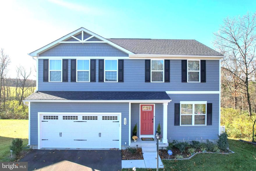 MOST PRIVATE LOT IN THE NEIGHBORHOOD! Situated on a premium, no thru street lot surrounded by trees and only one neighbor, this nearly new home offers exceptional privacy and a fully fenced yard, perfect for outdoor enjoyment.
Pull into your own two car garage and enjoy the wild, wonderful seasons through the windows and warmth of your new home! The main level features beautiful, low-maintenance LVP flooring throughout, including a flex room that can serve as an additional bedroom, office, playroom, or hobby space.  The main level mudroom from the garage and spacious closets and pantry storage space  are exceptional. The open-concept kitchen is a standout, boasting a large island for casual dining, ample cabinet space, and LVP flooring. The kitchen seamlessly flows into a spacious dining or seating area, ideal for both everyday meals and formal entertaining. A sliding glass door leads to the backyard, with the option to add a deck for enhanced outdoor living.  You will be happy to enjoy sipping your favorite beverage while watching the wildlife from the over the sink picture window.  The spacious living room offers a perfect room to hang your hat and rest your soul at the end of the day! 

Upstairs, all four bedrooms are thoughtfully located for added convenience. The primary ensuite has LVP flooring with a sizable walk-in closet.  It is a true retreat with a luxurious bathroom featuring an oversized walk-in shower. Three additional bedrooms and another full bathroom complete the upper level, providing ample space for family or guests. 

The home also includes a massive unfinished walkout basement with rough-in plumbing for a future bathroom, offering endless potential for expansion or customization. This home is tucked away in South Berkeley County which is close to major commuter routes, making it a perfect blend of convenience and comfort.

Don’t miss the chance to make this exceptional property your home—schedule your showing today!