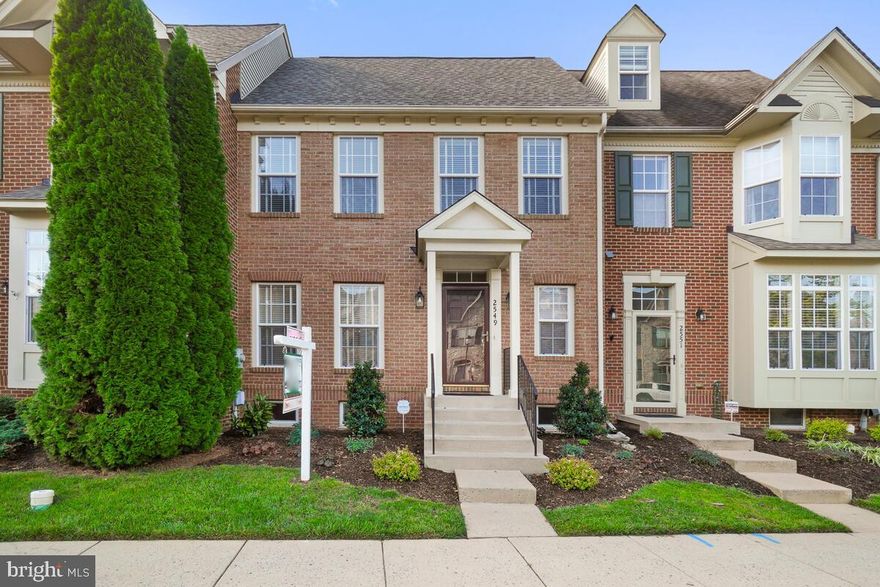 LARGE UPDATED 3000+SQ FT FEDERAL STYLE TOWNHOME WITH A DETACHED TWO CAR GARAGE AND PRIVATE PATIO STONE OUTDOOR LANDSCAPED LIVING SPACE LOCATED IN THE DESIRABLE WORMAN'S MILL ISLAND CCOMMUNITY.  NEW ROOF 2023. NEW FRONT LANDSCAPING 2023. MANY SMART HOME FEATURES.  THIS BEAUTIFUL UNIT FEATURES 4 BEDROOMS AND 3.5 BATHS.  WOOD FLOORS THROUGHOUT THE MAIN FLOOR AND UPPER LEVEL WITH A GRAND STAIRCASE.  THE LOWER LEVEL AND STAIRS ARE FULLY FINISHED WITH LUXURY CARPET.  THE UPPER LEVEL INCLUDES 2 FULL BATHS, LAUNDRY BETWEEN THE PRIMARY AND TWO BEDROOMS OVERLOOKING THE FRONT. THE VERY LARGE PRIMARY BEDROOM IN THE BACK OVERLOOKING THE PATIO UNIQUELY FEATURES ITS OWN GAS FIREPLACE AND CATHEDRAL CEILING, ALSO CALIFORNIA CLOSET DESIGNED WALK-IN CLOSET.