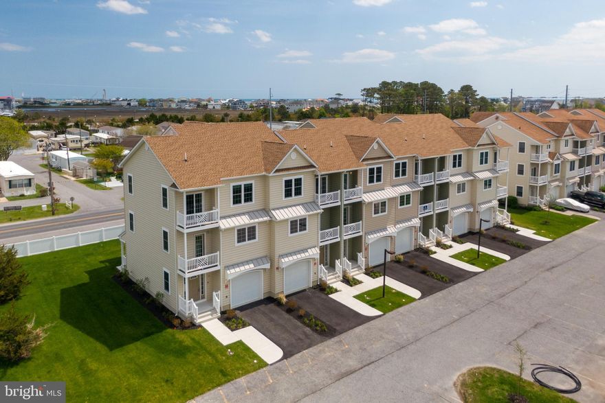 LAST TOWNHOUSE AVAILABLE! FURNISHED MODEL BY BETHANY RESORT FURNISHINGS! NEW CONSTRUCTION! CLOSE TO THE WEST OCEAN CITY MARINA AND BEACH. This beautiful 4 BR 3 1/2 BA Townhouse features over 2,200 sq ft of living area plus a one car garage. Features on the 1st level include a 1st floor master suite with full bath and walk in closet and one car garage. The 2nd level features a large open floor plan with one of the biggest living areas at the beach! Additional features on this level include a gourmet kitchen with custom Wolf Hanover Cabinets in White Stain and Grey Stain with Oil Rubbed Knobs, pantry and granite counter tops. GE Stainless Appliances, a Linear Electric Fireplace and a half bath. There are decks off both the front and back on this level! The 3rd floor features another master suite with a Liner Fireplace and private balcony, tiled bath with a large, beautiful walk-in shower and walk in closet. There are 2 additional bedrooms, another full bath and your laundry area on this level. The flooring is luxury vinyl throughout the kitchen and living areas and ceramic tile in the baths. There are ceiling fans in the living area and in each bedroom. There is also a community pool and playground. Sailors Watch is located in West Ocean City just west of the Rt50 Bridge on Golf Course Rd. This location is convenient to marinas, restaurants, shopping and of course the beach and boardwalk. Great location if you are a boater or boat owner and want to be close to Sunset Marina or the public boat ramp. This property is ideal for year-round occupancy, to use as a vacation home or a vacation rental! This building is VA approved! Do not miss this opportunity! Contact the listing agent for additional details or to visit this property! THIS PROPERTY IS READY FOR YOU TO MOVE IN TODAY AND ENJOY THE SUMMER! SOLD FURNISHED!
