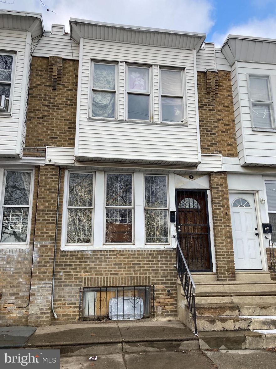 New roof  and new skylight in April 2025!  Property is being sold in AS-IS condition. This cozy 3-bedroom, 1-bath row-house in Southwest Philadelphia is perfect starter home or investors seeking excellent rental returns. Featuring hardwood floors throughout the first and second floors, this home offers much comfort in a convenient location with a backyard deck. Situated on a quiet, well-maintained block with ample street parking, the property is just steps from a local park.  Its proximity to Cobbs Creek Parkway and public transportation at the end of the block makes commuting a breeze. Whether you’re looking for a place to call home or an investment rental property, this house is a fantastic opportunity. Easy to schedule showings—don’t miss out!