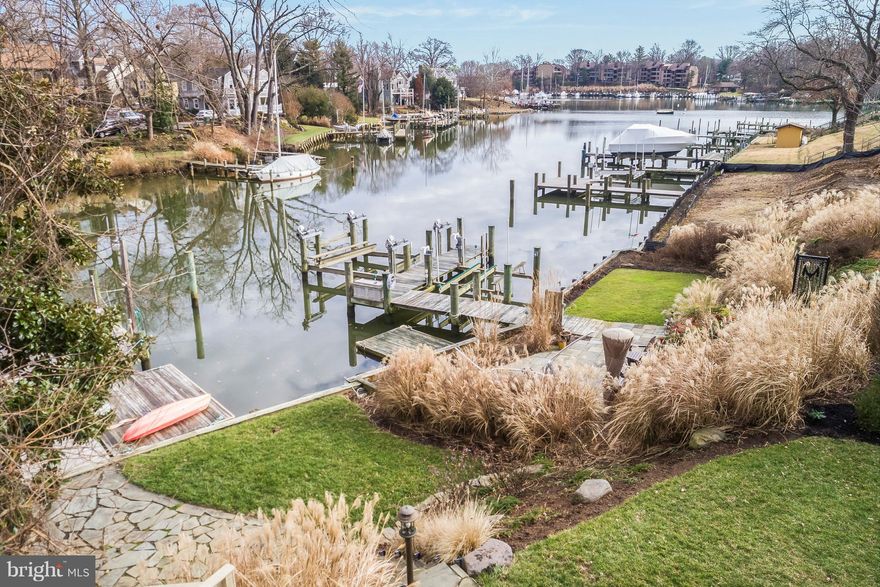 Prime Murray Hill Location! This elevated one-level living, waterfront home offers views of Spa Creek, a recent private dock and bulkhead (2012), terraced patio, flagstone walkways & landscaping designed by McHale. This 4 bedroom, 3.5 bath home has been well maintained and includes 2 working fireplaces, a large office suite (potential 2nd master bedroom), fully finished lower level & workspace. Attached 2-car garage and driveway.