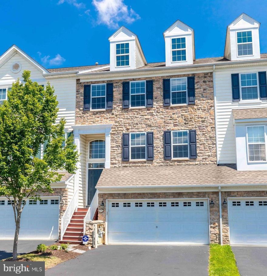 Welcome home to this beautiful, sun-drenched townhome in the desirable Reserve at Chesterfield community, just minutes from West Chester Borough shops and restaurants! Conveniently located right off of Route 3 and in the award-winning West Chester Area School District, this gorgeous home is move-in ready and awaiting its lucky new owners. Enter the main level to bright and spacious open-concept living with an inviting living and dining space featuring crown molding and gorgeous round columns.  Walk past the half bathroom and coat closet to find gorgeous hardwood floors, an updated kitchen with stainless steel appliances, beautiful white cabinets, a cozy family room with impressively high ceilings and a gas fireplace. Off of the breakfast nook, sliding doors give you access to the deck where you can enjoy a good book and a glass of wine with a tree-lined view! Upstairs, practically tucked into the trees, features a luxurious master bedroom with tray ceilings, three closets AND and a convenient nook for your home-office needs! An enclosed look-out over the family room fills this nook with additional sunlight that really brightens the room.  The en-suite bathroom includes a double vanity, relaxing soaking tub and a walk-in shower.  Walking down the hall you’ll find conveniently located laundry and storage space.  At the end of the hall are two generously sized bedrooms (one with recessed lighting!) and a spacious hall bathroom and linen closet.  The bottom level features a fully finished walk-out basement with ample storage, an additional half bathroom and access to the two-car garage.  Enjoy new appliances including: Bosch dishwasher (2022), Whirlpool range oven (2022), Whirlpool clothes dryer (2022) as well as new custom window blinds (2022) and hot water heater (2019).  This is not a home that you want to miss, make your appointment today!