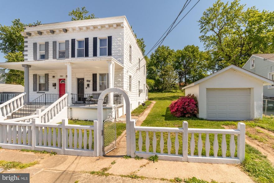 Beautiful Porch Front Charmer with One Car Detached Garage! Home has been completely renovated! Great Open Floor Plan with Hardwood Throughout. 42 Inch White Kitchen Cabinets with Breakfast Bar and Stainless Steel Appliances. Sunroom off kitchen adds a great space for entertaining! Full bath on the first floor. Three bedrooms on the second level with updated bath. New windows throughout the home. and new roof. Large lot with a deep back yard.