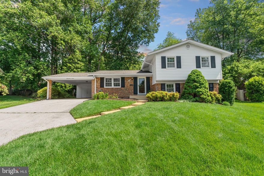 Welcome to this beautifully maintained 5 bedroom, split level located in the desirable Stonewall Manor community.  The exterior is a combination brick and vinyl siding with a double carport and attached shed for storage.  The lot is spectacular, situated on a cul-de-sac with gorgeous mature trees and flowering shrubs.  Built in 1960 and well maintained, this home boasts  desirable features inside and out.  Being able to enjoy the tranquility of the backyard, this home has a large deck and shed for additional storage of lawn equipment. Inside boasts beautiful hardwood floors on main level and three upper level bedrooms, carpet in family room and primary bedroom.  Home  has 5 bedrooms (lower level being used as a bar currently). Updates include roof,  HVAC 2021, hot water heater 2015 and windows.  Location can't be beat with easy  access to the W&OD, downtown Vienna, Mosaic, Cedar Lane shopping, Metro, interstate 66, and interstate 495.