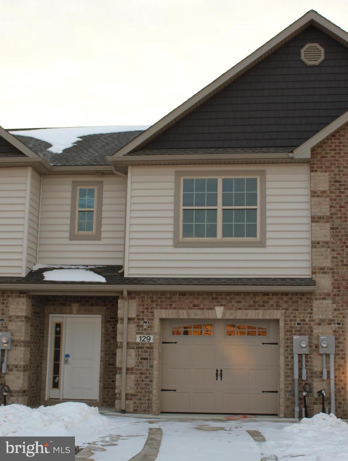 VERY IMPRESSIVE BRAND NEW townhouse offers UPSCALE finishes. This new townhouse is located on a cul-de-sac with large backyard. You will can enjoy beautiful sunsets from the covered concrete patio. Wait until you see the upgraded kitchen cabinets and granite countertops. The kitchen also offers S.S. appliances, under counter lights, oil rubbed bronze faucets, and a stone backsplash. Open family room and dining area with a large patio door which leads to a concrete covered patio. Spacious primary suite with a large walk-in closet, as well as a secondary closet for additional storage. The primary bath includes a spacious shower and double bowl vanity with granite countertops. The laundry room with laundry sink is conveniently located on the second floor. Accent lighting with crown molding in the family room/kitchen are as well as the primary bedroom. This townhome also features a one car garage, 3 bedrooms, 2.5 baths and tile floors on the main level for easy maintenance.