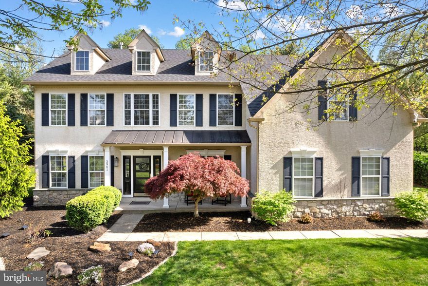 Welcome to 3901 Charter Club, the epitome of luxury living in the highly sought-after Ridings of Buckingham and award-winning Central Bucks East School District. Nestled in one of Bucks County’s most desirable neighborhoods, this exceptional 4-bedroom, 2.5-bath home blends timeless architecture, elegant upgrades, and modern comfort just minutes from shopping and dining in downtown Doylestown, Doylestown Hospital, and the Doylestown Airport. Showcasing a classic traditional colonial layout with a dramatic two-story foyer, this home offers the perfect balance of sophistication and functionality. From the moment you arrive, the stunning curb appeal stands out with a covered front porch featuring a new metal roof, black shutters, manicured landscaping, and a side-entry two-car garage. Inside, you’ll find gleaming hardwood floors, fresh paint, updated lighting throughout, elegant wainscoting, and sun-drenched living spaces designed for both everyday living and entertaining. The formal living room and adjacent formal dining room are filled with natural sunlight and provide the perfect spaces for gatherings and special occasions. The spacious eat-in kitchen features white cabinetry, granite countertops, stainless steel appliances, tile backsplash, new tile flooring, and sliders leading directly to the private backyard, creating seamless indoor-outdoor living. The kitchen opens to the impressive two-story family room with soaring ceilings and expansive windows that flood the space with natural light. A beautifully upgraded first-floor powder room and convenient first-floor mud/laundry room add both style and everyday functionality. The first-floor office with glass French doors provides an ideal private workspace or flex room. Upstairs, the luxurious primary suite offers a spacious sitting room, abundant closet space, and a spa-like bath complete with a soaking tub and new double vanity. The additional bedrooms are generously sized, while the refreshed hall bath features a new double vanity and a timeless black-and-white modern design. Recent improvements include a new roof and gutters, new hot water heater, new carpet, new washer and dryer, and thoughtful updates throughout. The large unfinished basement provides endless possibilities for future living space, home gym, media room, or recreation area. Step outside to a peaceful backyard setting that backs to mature trees, offering exceptional privacy and a serene natural backdrop perfect for relaxing or entertaining. This beautiful turnkey home offers luxury finishes, timeless colonial charm, and an unbeatable location in the heart of Bucks County. A rare opportunity to own a meticulously maintained home in one of the area’s premier communities.