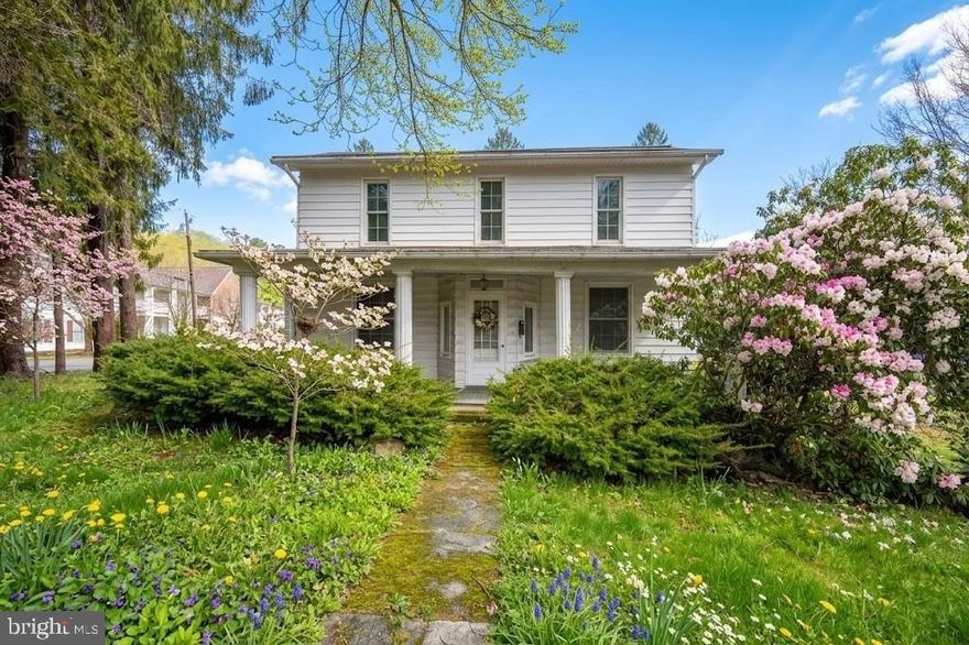 Welcome to this beautifully updated 1901 home in the heart of downtown Oakland, where historic character meets modern convenience. Situated on a charming lot with mature landscaping and blooming trees, this home offers timeless curb appeal with a welcoming covered front porch perfect for relaxing and enjoying the neighborhood.

Inside, you’ll find modern updates throughout while preserving classic architectural details. The main level features spacious living areas filled with natural light, a thoughtfully updated kitchen with stylish cabinetry, stainless steel appliances, and sleek countertops, as well as the convenience of a main-floor bedroom and full bath—ideal for guests, a home office, or single-level living.

Upstairs, the home offers three additional bedrooms and another full bathroom, providing plenty of space for family, guests, or flexible living arrangements. Large windows throughout the home bring in abundant natural light while highlighting the home’s historic charm.

Outside, enjoy a private driveway with carport, offering convenient off-street parking. The property is surrounded by established greenery and colorful seasonal landscaping, creating a peaceful setting just moments from everything downtown Oakland has to offer.