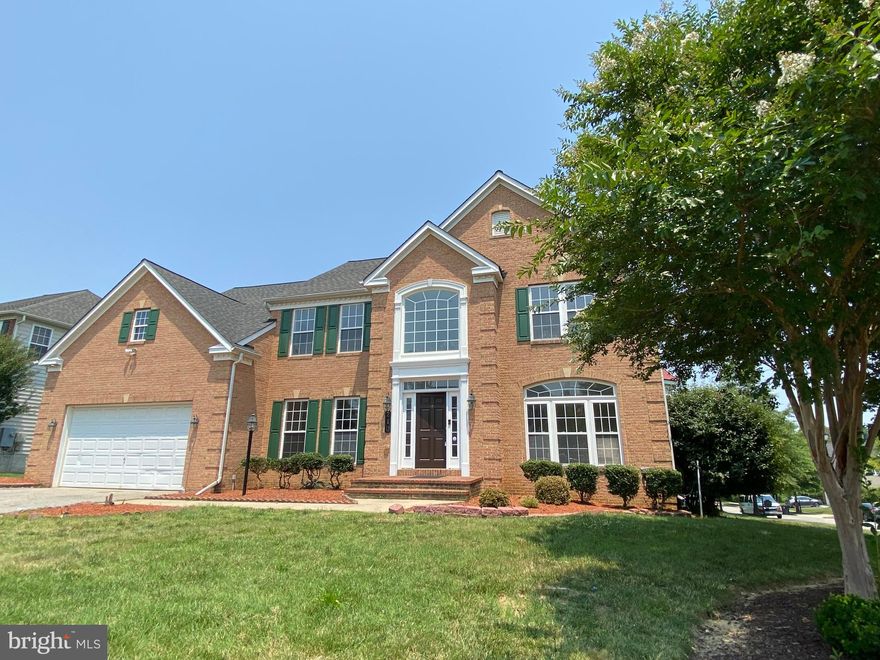 Bright and beautiful 3 level colonial with 4 bedrooms and 3.5 bathrooms on the corner lot in Potomac Ridge community.  Gracious foyer, abundant natural light, welcomes you to an open and flowing floor plan. Inviting living room with sun lit   bay window and columns. Open dining with windows, tray ceiling and columns.  Bright two story family room with gas fireplace. Spacious kitchen with cherry cabinetry, tile back-splash, granite counter tops, stainless appliances, center island with cook-top, and recessed lights. Open breakfast area. Upper master suite has tray ceiling, walk-in closets, private master bath, ceramic tile flooring, relaxing soaking tub and separate shower. Three additional bedrooms: two share a "Jack & Jill" bathroom and one has its own bathroom. Freshly painted home and new carpeting through-out.  New   refrigerator, new dishwasher, new microwave, new cook-top, new washer and new dryer. Spacious unfinished basement with walk-out french doors. Bike trails connecting to Capitol area paths. Close to National Harbor and minutes to Old Town, Alexandria. Easy access to I95, I495, I395, Pentagon, and Washington DC.