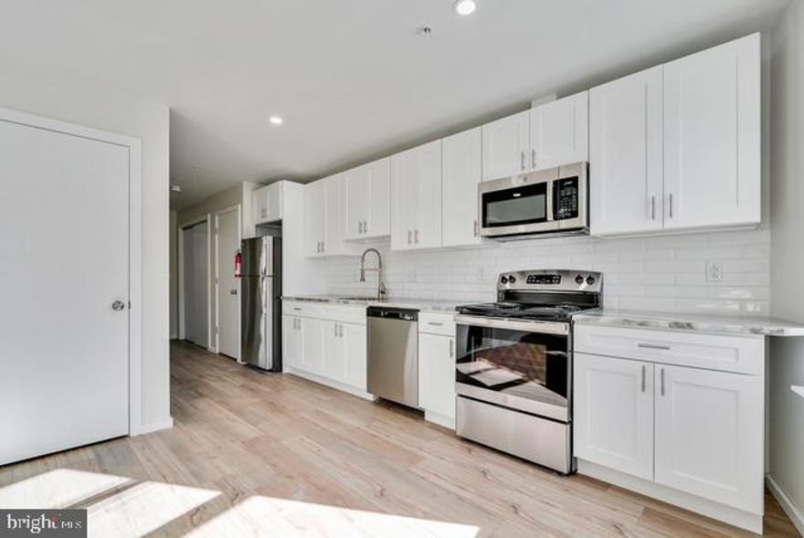 Just Start Packing and move into this beautiful 1BR 1BA unit in Germantown. Located on the first floor, you'll find a modern apartment with a full kitchen with stainless steel appliances including refrigerator, microwave, range/oven and dishwasher. No need to look for a laundromat nearby, there is a washer/dryer in the unit, making it super convenient. There are hardwood floors throughout and wall units for air and heat. Tenant is responsible for electric. There is a bike room in the building for usage as well. First, last and security are due for move in. To apply, use RentSpree link.