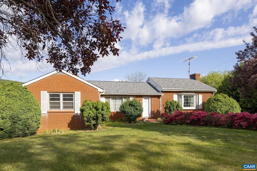 Charming all-brick home set in a truly exceptional location where the views take center stage. Surrounded by farms with sweeping mountain and pastoral vistas, this property offers a rare opportunity to create something special. The home features 4 bedrooms, 2 baths, and over 2,100 sq ft on the main level. A later addition expanded the primary bedroom, though septic is assumed for 4 bedrooms. Interior highlights include hardwood floors, natural trim, and original pine cabinetry in good condition. Spacious living room plus a large family/dining combination with a wood-burning brick fireplace. Partial basement with woodstove insert adds additional flexibility. Carport could easily be converted into a workshop or enclosed space. Home needs updates and is priced with that in mind?ideal for those looking to add value. Conveniently located minutes to Gordonsville, 20 minutes to Route 29 or I-64, and an easy drive to Charlottesville. Fiberlync internet available. Inspections are welcome but home is being sold as-is.,Formica Counter,Wood Cabinets,Fireplace in Basement,Fireplace in Family Room