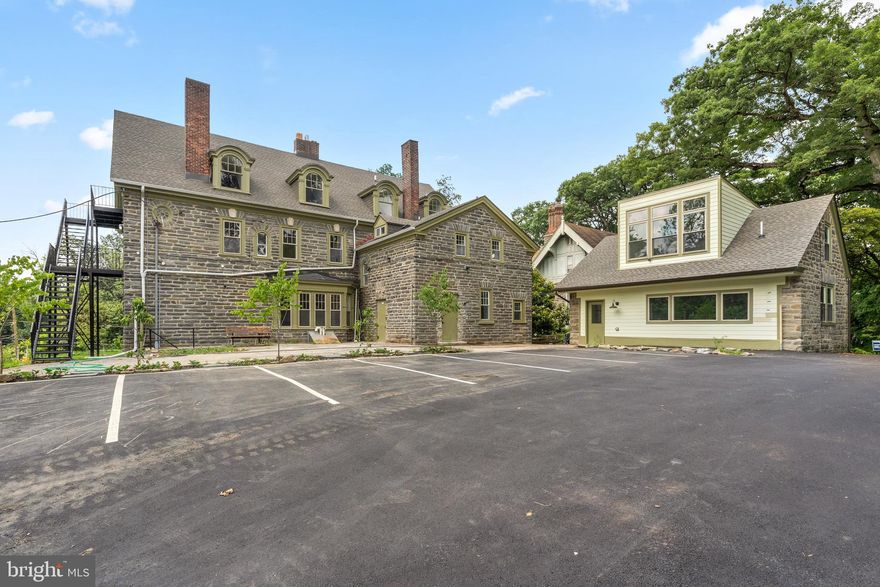 Welcome to 6401 Wayne Avenue. A beautifully rehabbed historic stone home repurposed into seven 1-bedroom apartments and a 1-bedroom 1.5 bath Carriage House. Each unit features restored hardwood floors throughout, gorgeous original details and amazing natural light. Fresh and modern updates have been added including central A/C, stainless steel appliances, in unit washer and dryer, and timeless light wood cabinets in the kitchen and baths. The building also offers designated off-street parking, additional storage and common outdoor areas. Conveniently located near the Tulpehocken Train Station and easy access to Kelly Drive, Wissahickon Park, Ultimo Coffee and Weavers Way.

Photos are from multiple units.