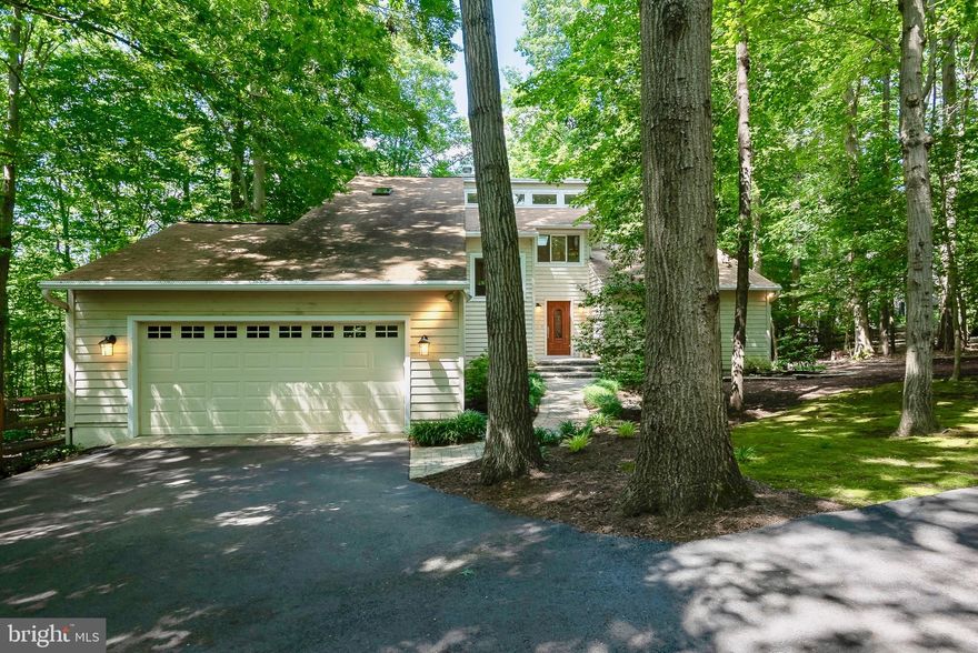 Accepting Back Up Offers! You Won't Want To Miss This Gem! A Wooded Retreat Tucked in a Lush Setting on 1.4 Acres in The Ridges at Annapolis.  Beautiful 3 Level Contemporary in Exceptional Condition.  Features 4 BR, 3 Full Baths, Music/Bonus Room  & Au Pair Suite. Updated Gourmet Kitchen, Custom 42" Maple Cabinetry, Granite Counters, Custom Shelving, Under Counter Lighting, Glass Shelves, Lighted Cabinets, Dacor 6-Stainless Steel Burner Range, GE Double Door Stainless Steel Refrigerator.  New Ceramic Flooring, Adjoining Pantry & Mud Room/Laundry.  Open Floor Plan w/Soaring Ceilings in Living Room  & New Fireplace.  Enjoy your Coffee in the morning on the Scenic Deck off the Living Room & Screen In-Porch for Outdoor Entertaining.  Newly Remodeled Master Suite & Walk In Closet. Lower Level Offers a Spacious Au Pair Suite w/Ceramic Shower Bath, Kitchenette & Private 4th Bedroom.  Inviting Fam Room/Home Theatre w/Sliders to the Lower Patio Terrace. Windows, Sliders, Skylights & Roof Recently Replaced.  Bonus Room/Music/Fitness or Optional 5th Bedroom.  Storage Room & 2 Car Garage. Community Playground/Tot lot.