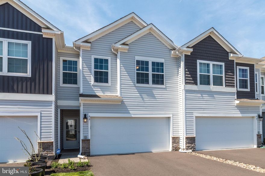 Welcome to this beautifully maintained, newer construction townhome located in the desirable Fonthill community in Quakertown. Built in 2022, this spacious home offers a modern open-concept layout for both everyday living and entertaining. The main level features a bright and inviting living  area that flows seamlessly into the dining space and kitchen. The kitchen has, granite countertops, stainless steel appliances, and a large center island perfect for gathering. Upstairs you'll find 4 generously sized bedrooms, including a primary suite with walk-in closest and private en-suite bath. Upgrades include white shaker cabinetry featuring soft-close doors and drawers in the kitchen and full baths, private rear patio with privacy fence, additional storage in garage, EV charging availability, prepped for whole house water softener system and RO drinking system.  Seller is a PA licensed real estate agent. Professional photos coming soon.