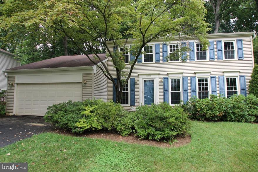 Take advantage of this great deal!  Seller motivated and priced it to sell! Remodeled Kitchen, Hardwood on Main Level, Replacement Windows, Big Deck with stairs to yard, Finished Walk Out Bsmt with 5th BR and 3rd Full Bath. 4 nice size bedrooms upstairs.  Baths are original but house is fresh and clean and move in ready!  Don't miss out on a great buy!  New Carpet and Fresh Paint!  Great Community